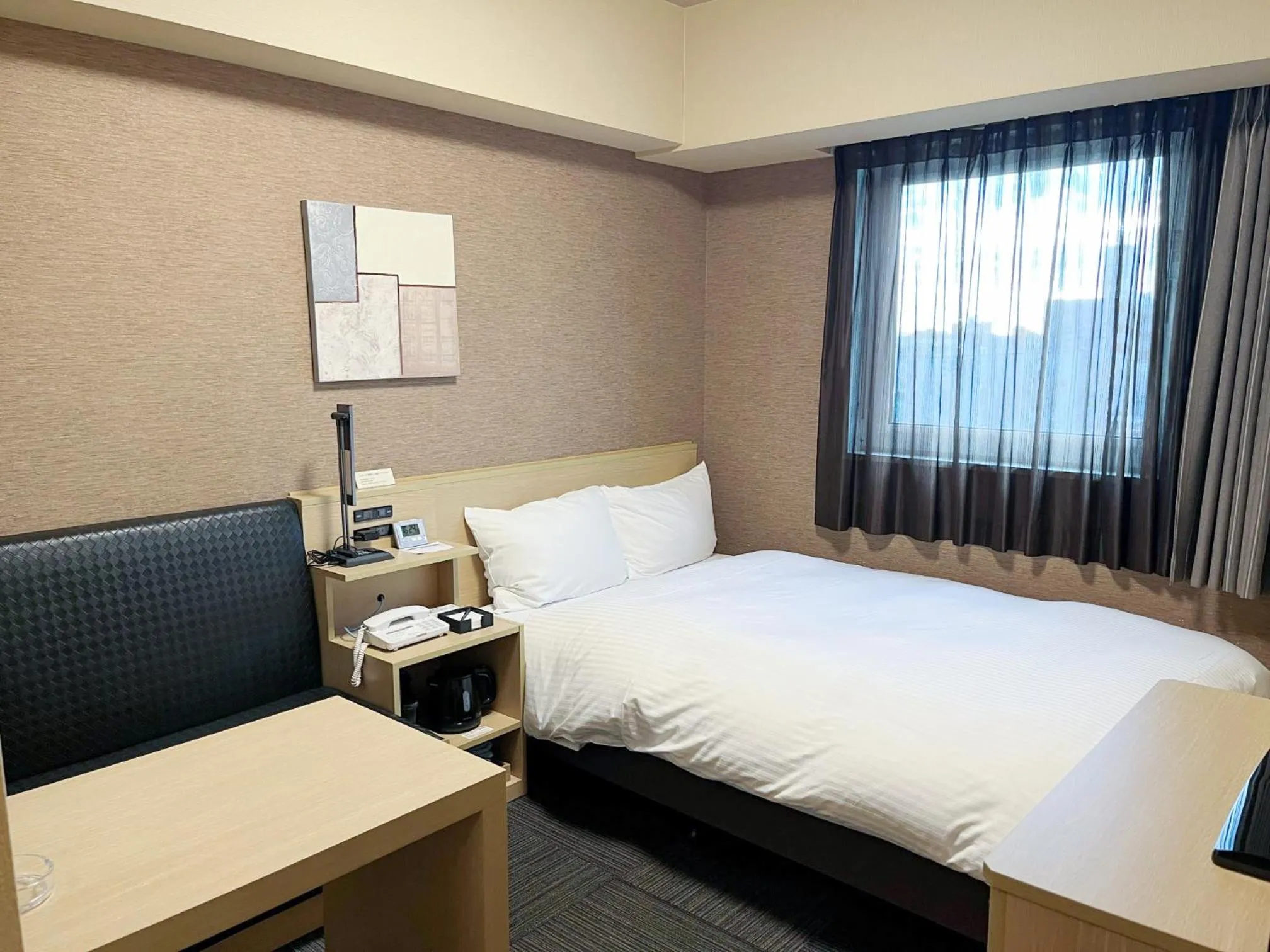 Photo of the whole room, Bed in Hotel Route-Inn Toyohashi Ekimae