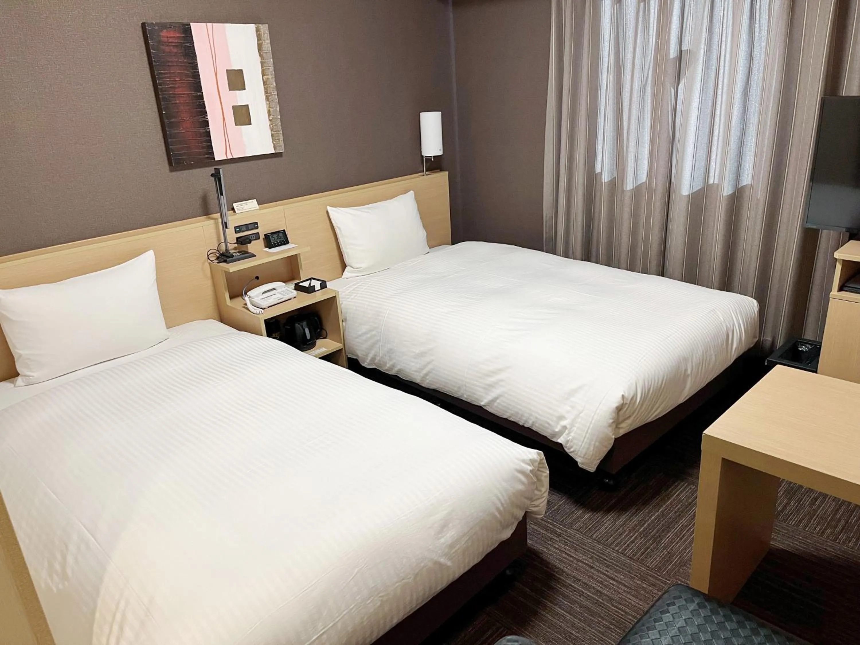 Photo of the whole room, Bed in Hotel Route-Inn Toyohashi Ekimae