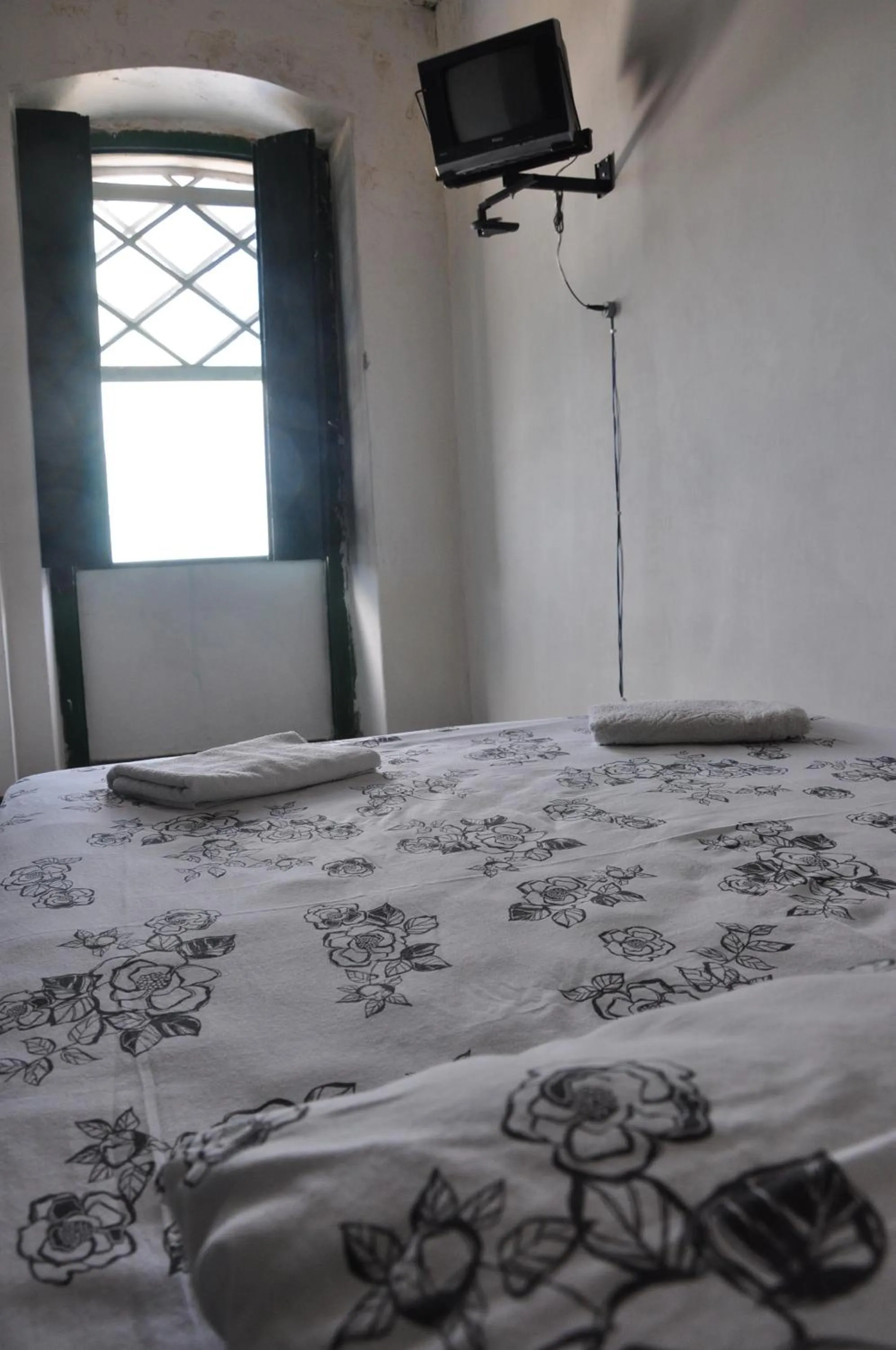 Bed in Pousada Solar dos Romanos