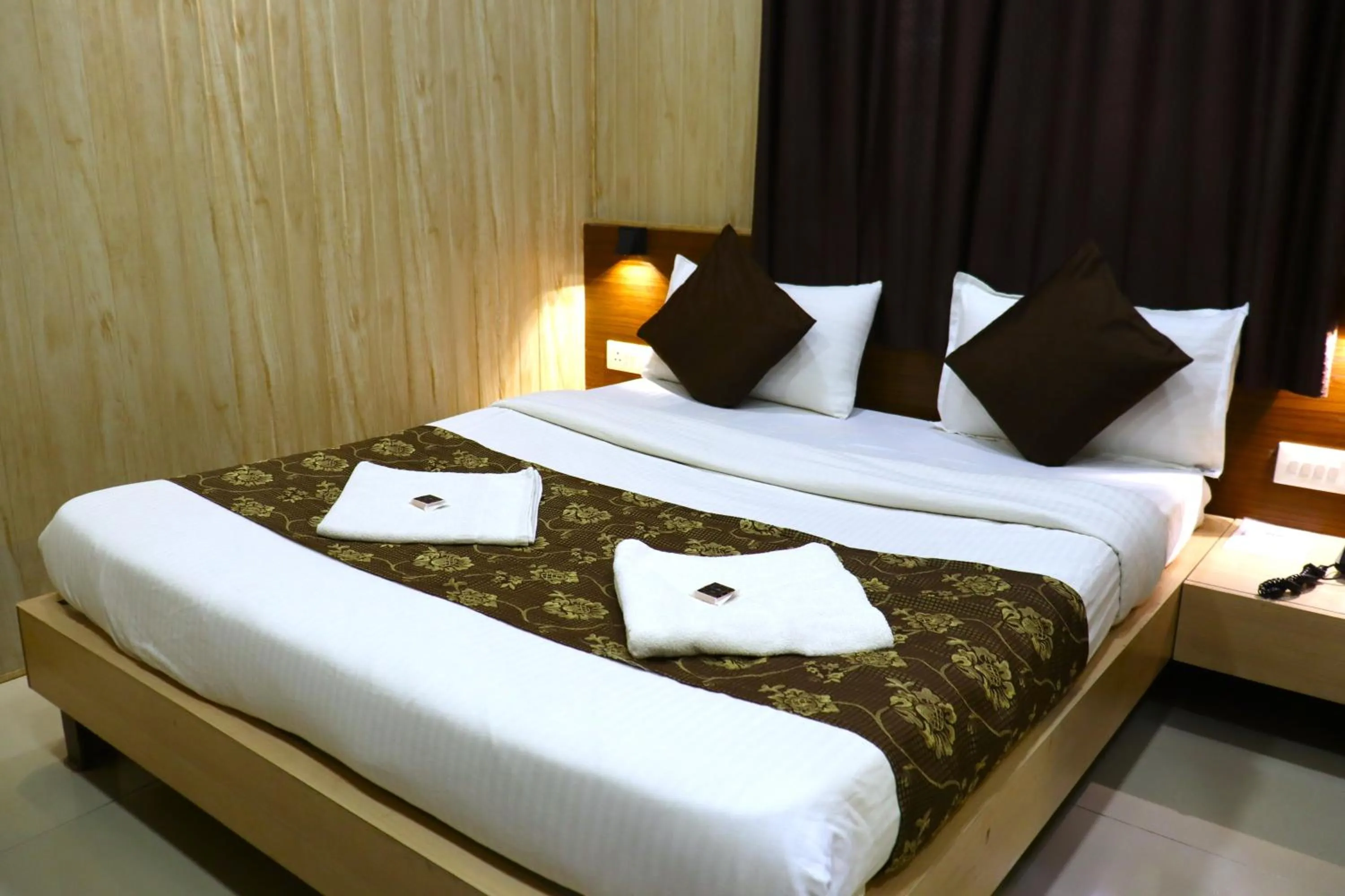 Bed in Hotel Midtown Inn