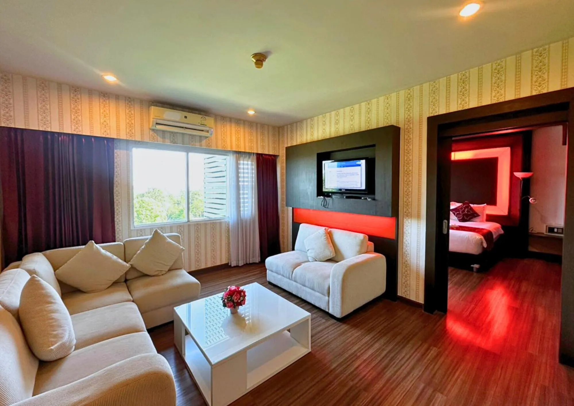 Seating area, Bed in Akelada Hotel