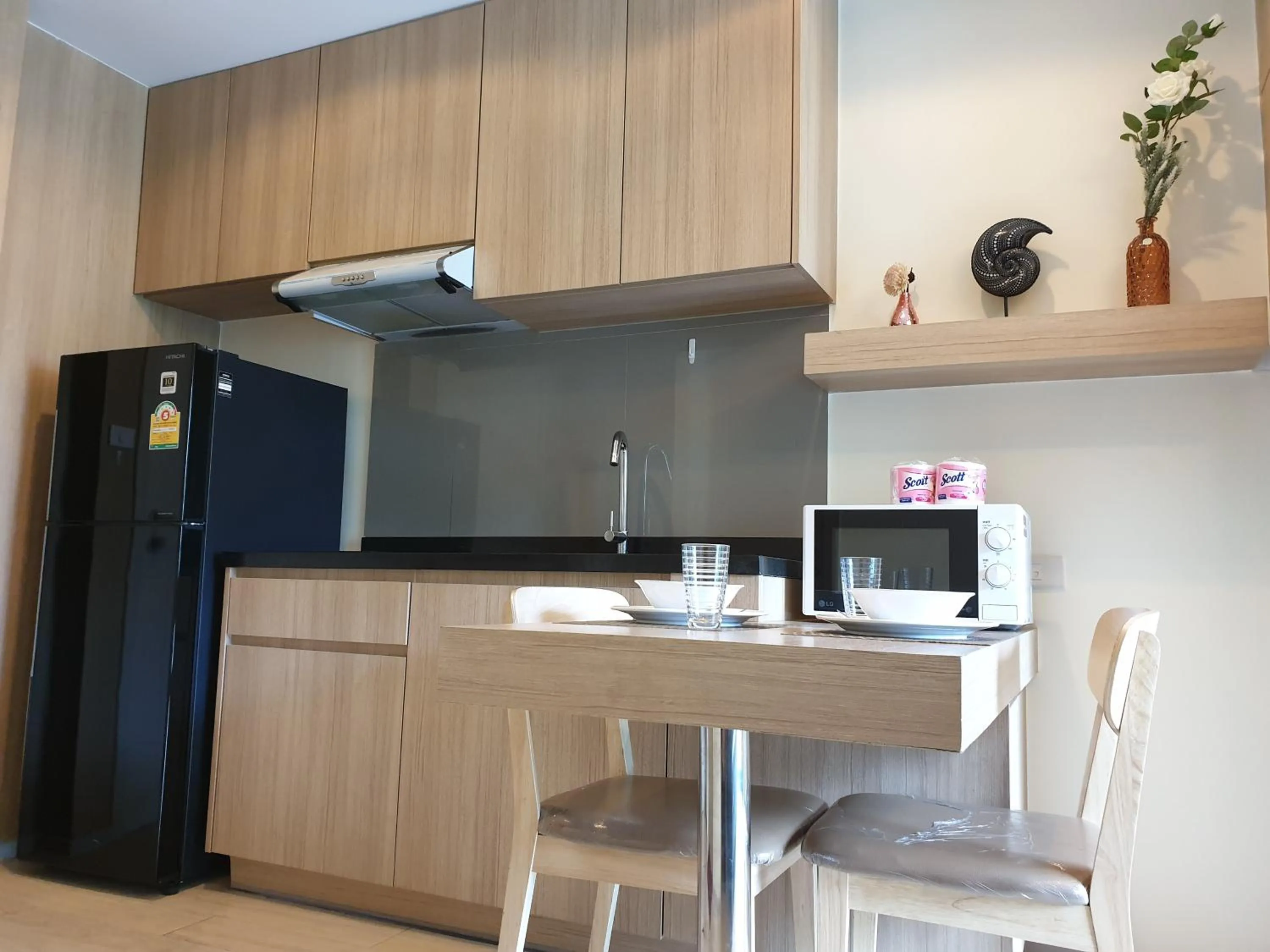 Kitchen or kitchenette in The Chezz by Patsamon