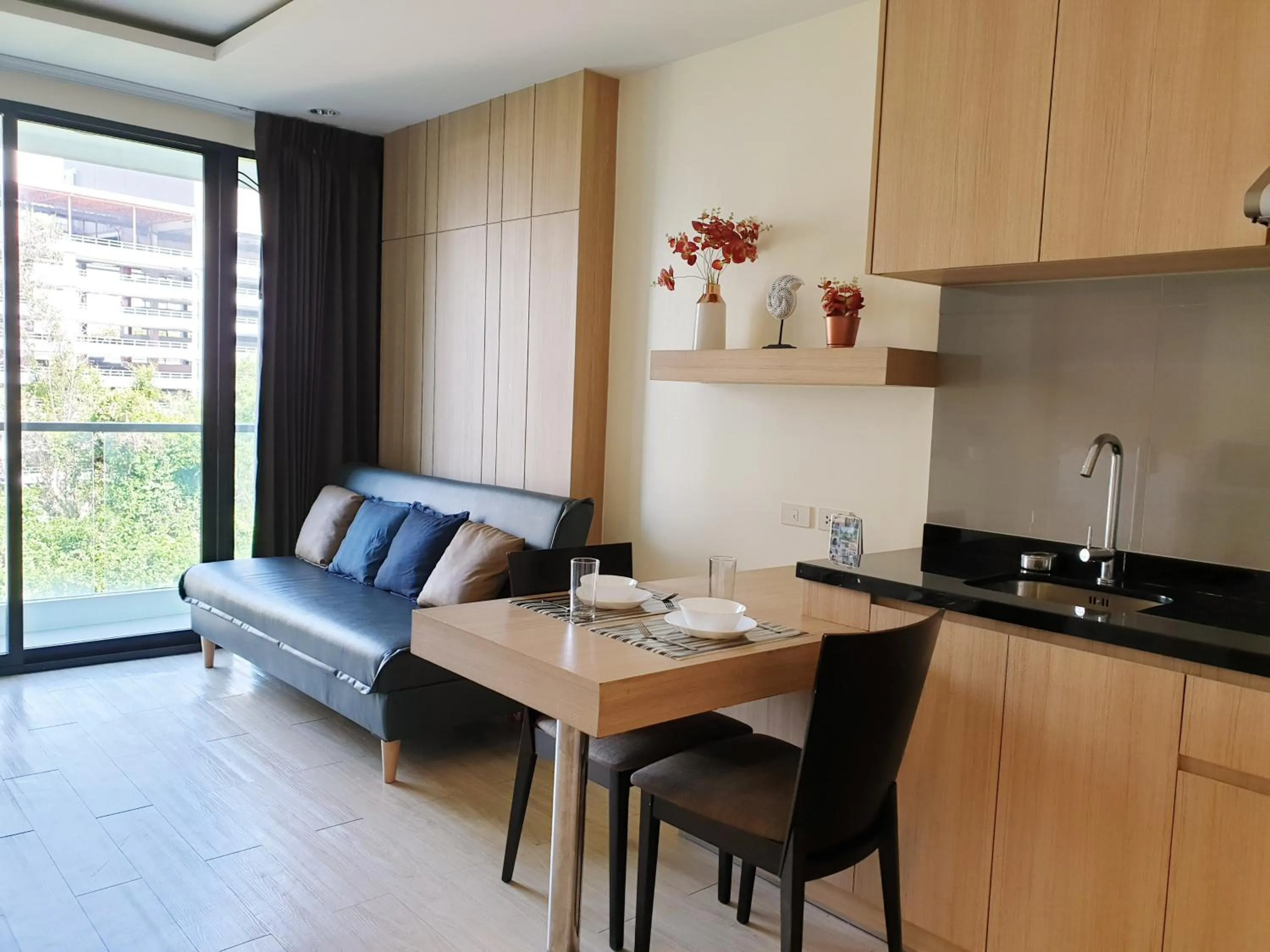 Living room in The Chezz by Patsamon