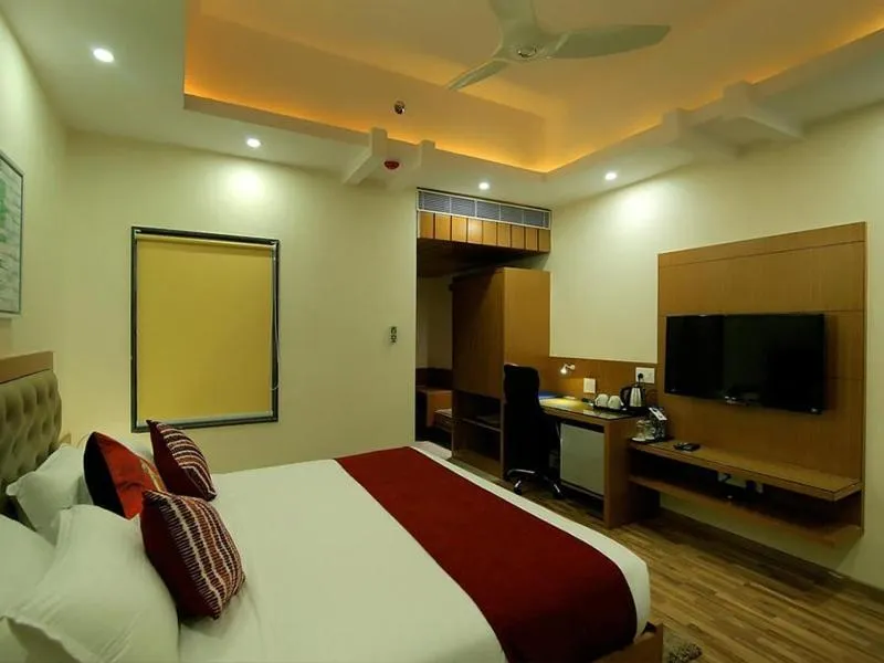 Photo of the whole room, Bed in Hotel Hampi International