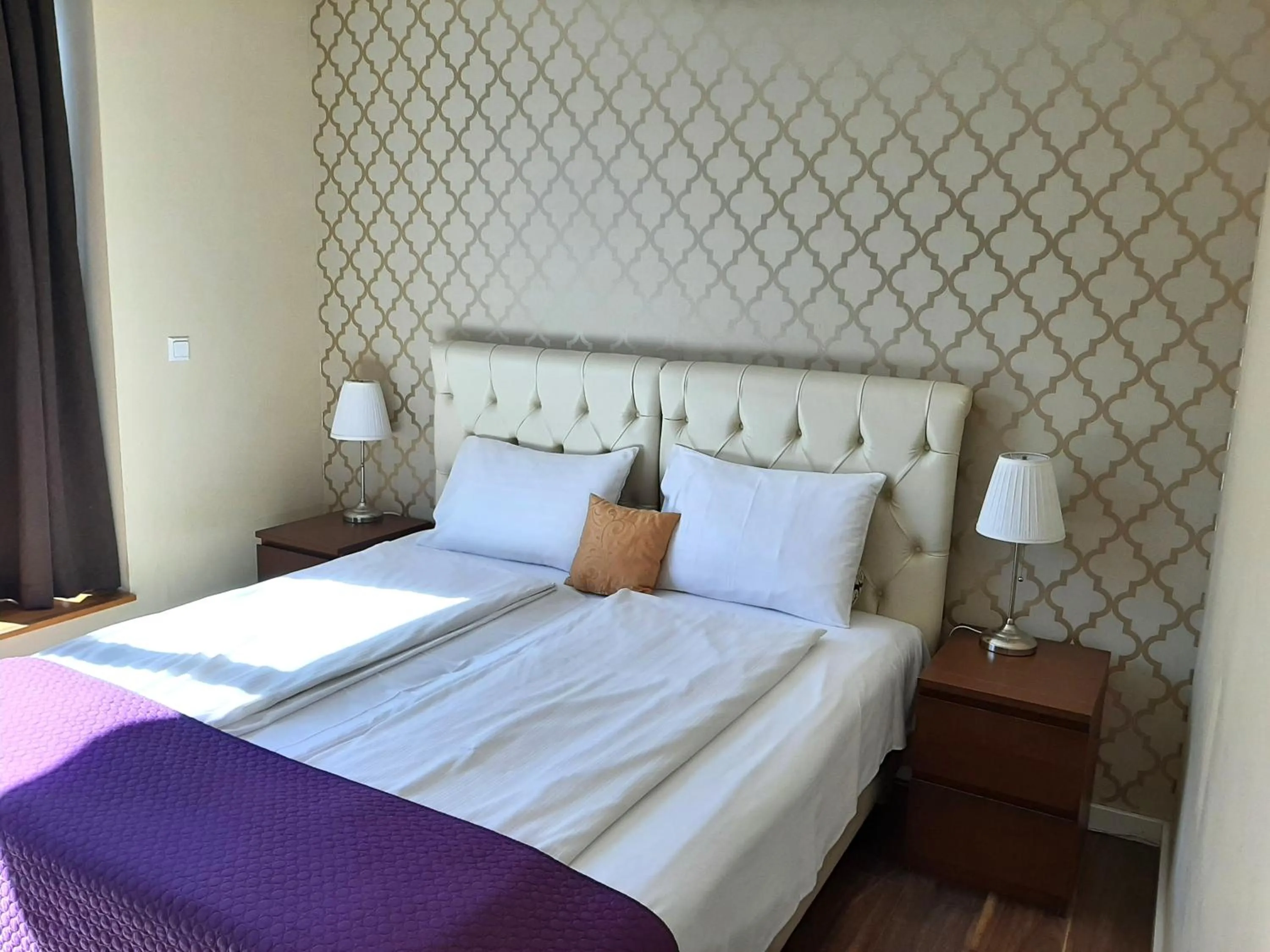 Bedroom, Bed in Trendy Deluxe Apartments