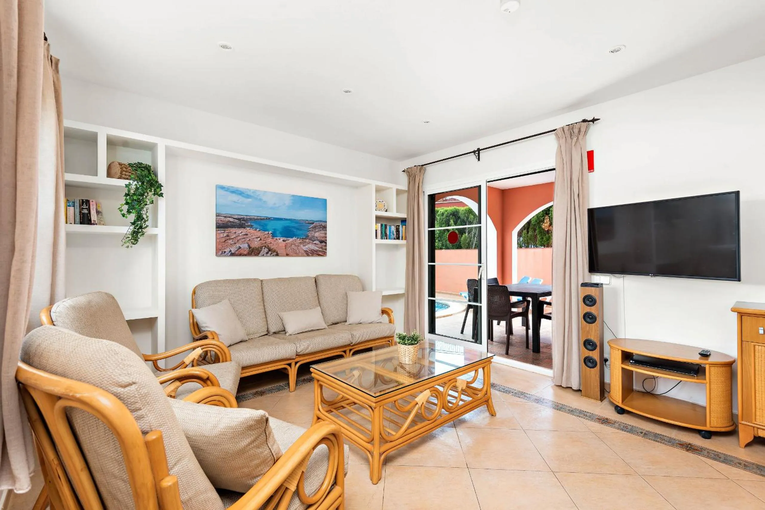 Communal lounge/ TV room in Villas Cala Galdana