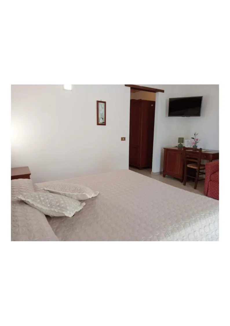 Bed in Hotel Grotticelli