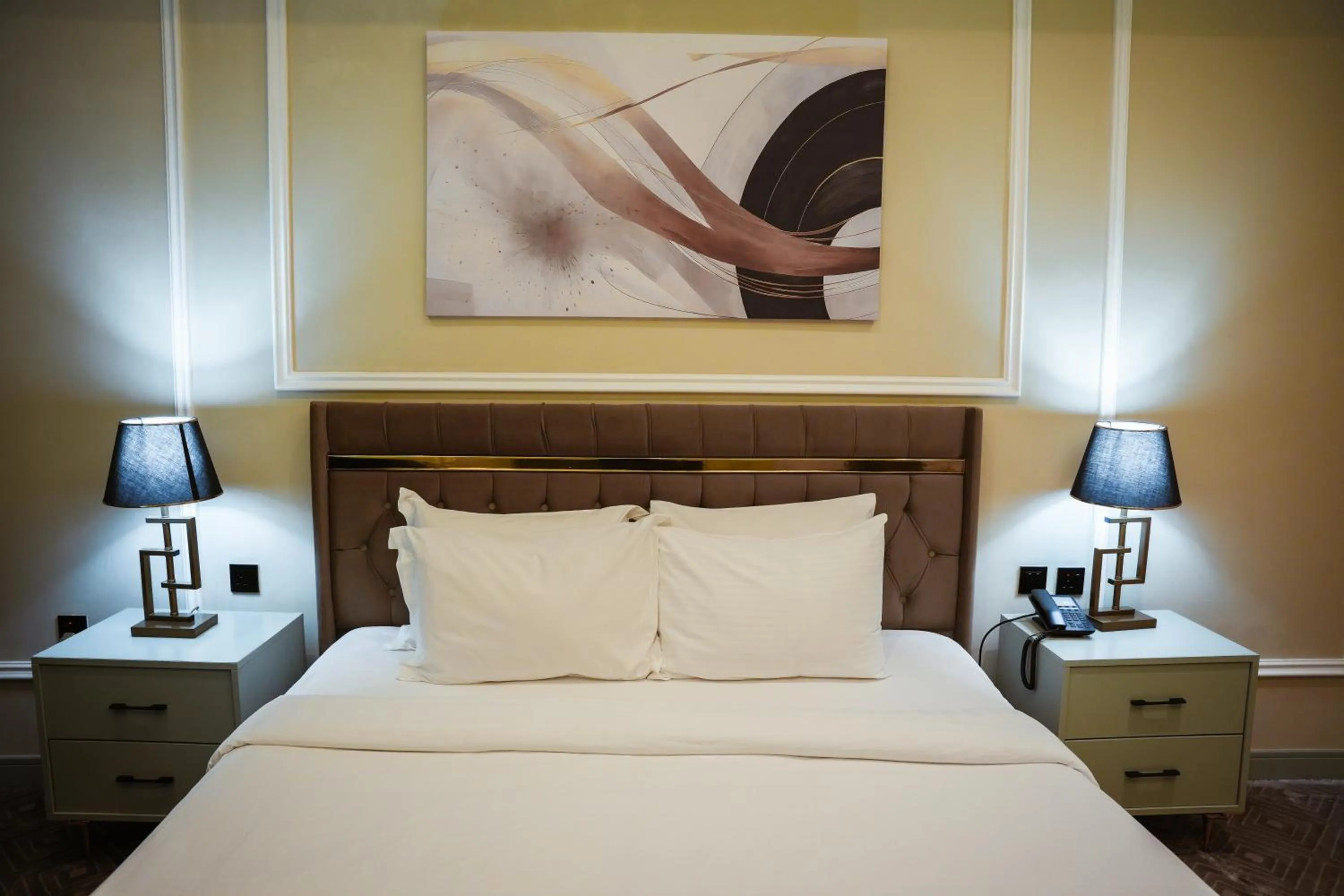 Bed in Al Mansour Plaza Hotel