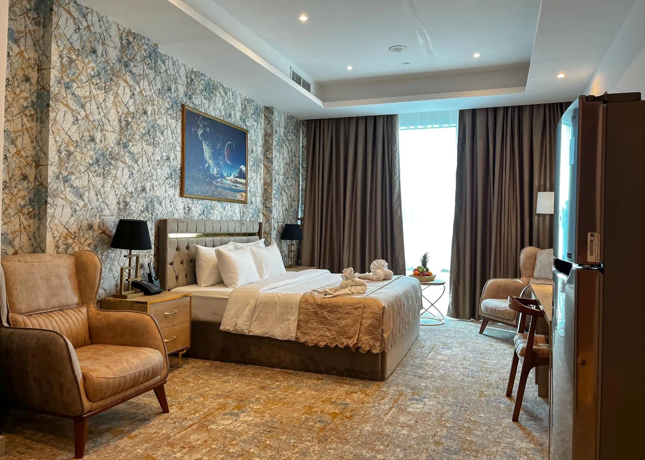 Bed in Al Mansour Plaza Hotel