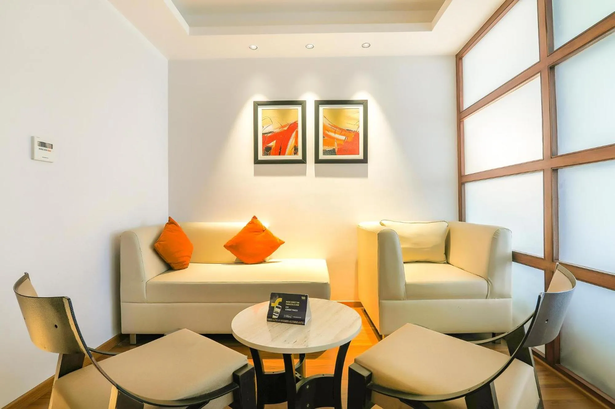 Seating area in FabHotel High Rise Suites - Nr Marathahalli Bridge