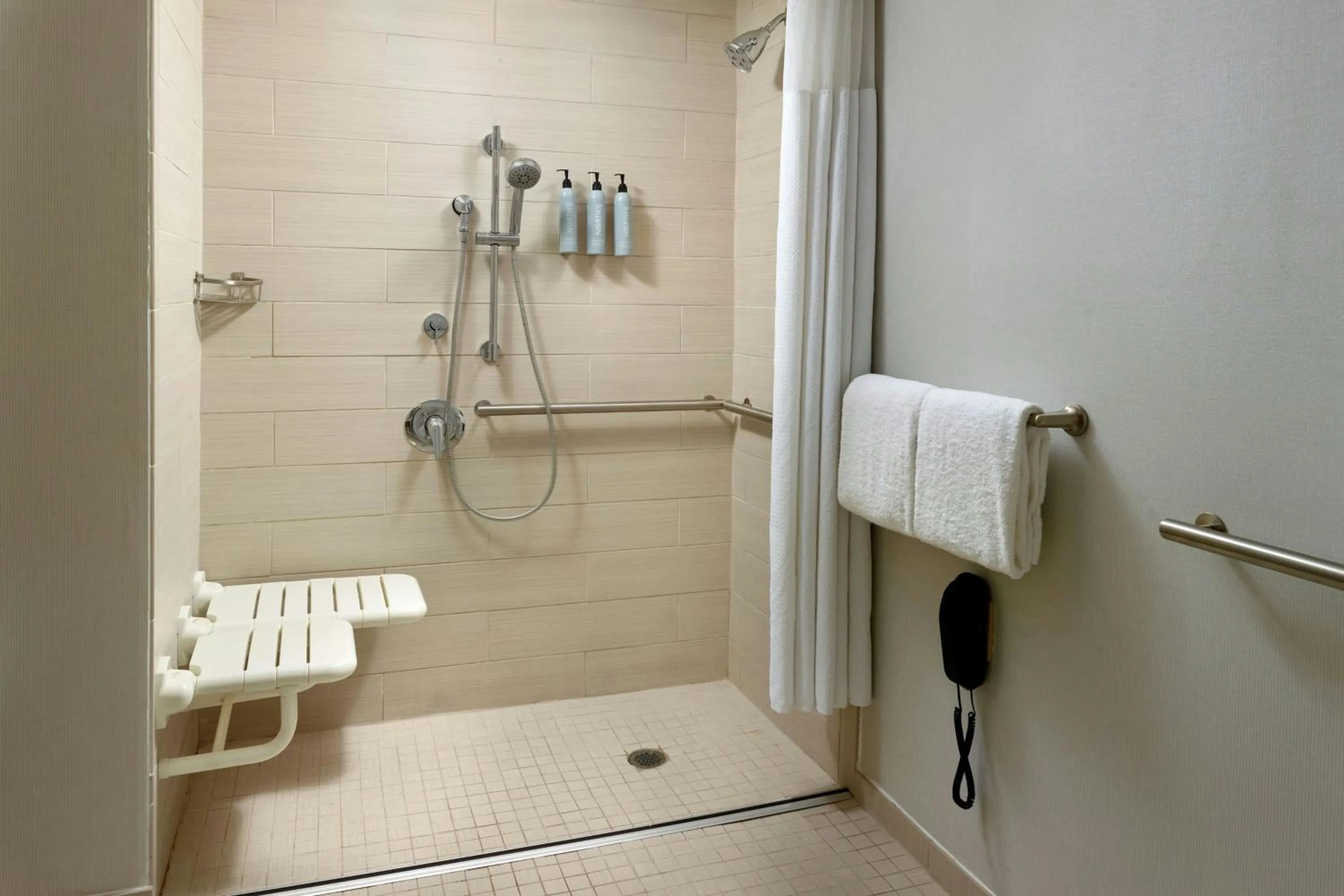 Bathroom in Courtyard by Marriott Birmingham Downtown at UAB