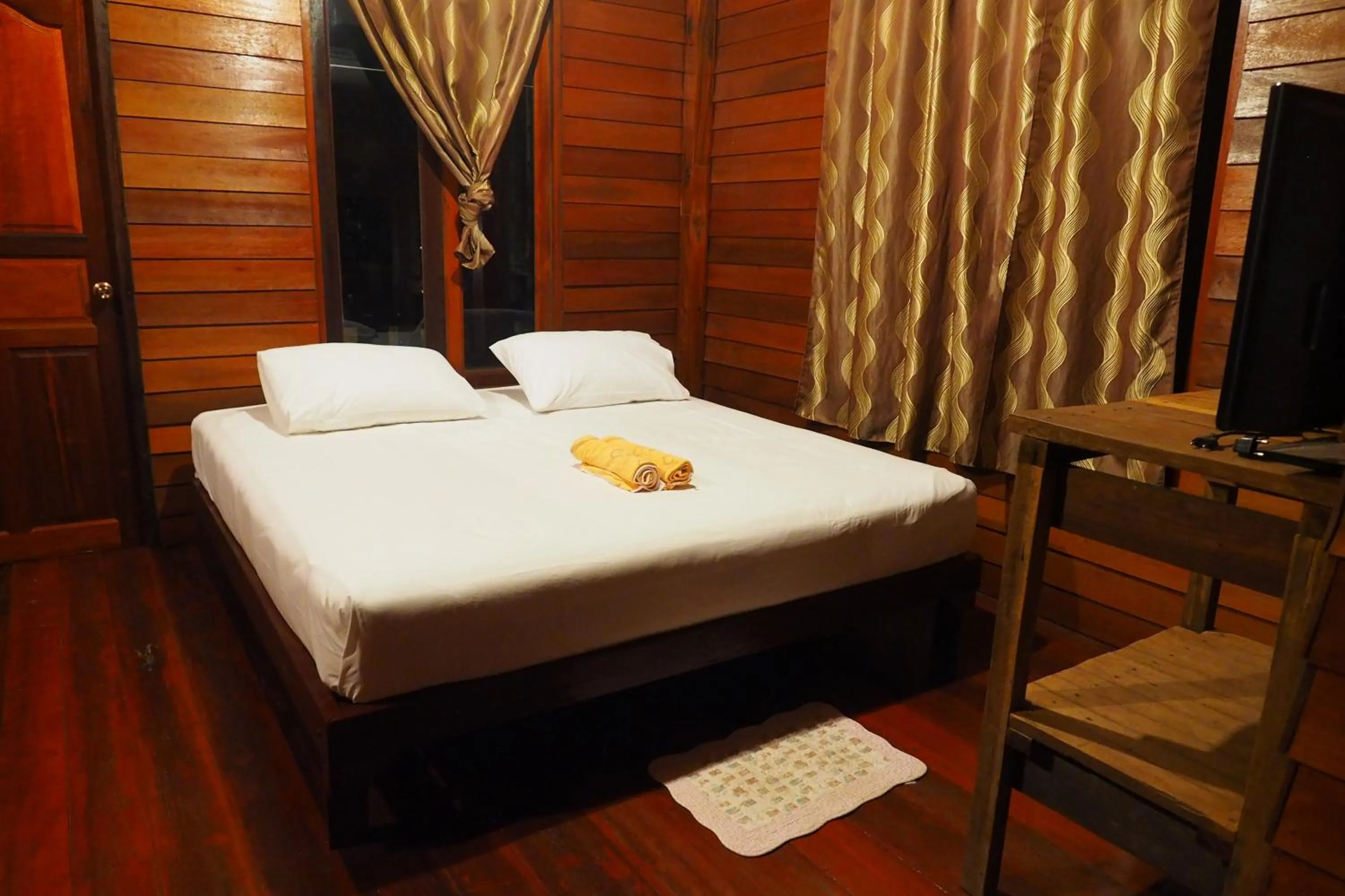 Bed in Home Style Resort