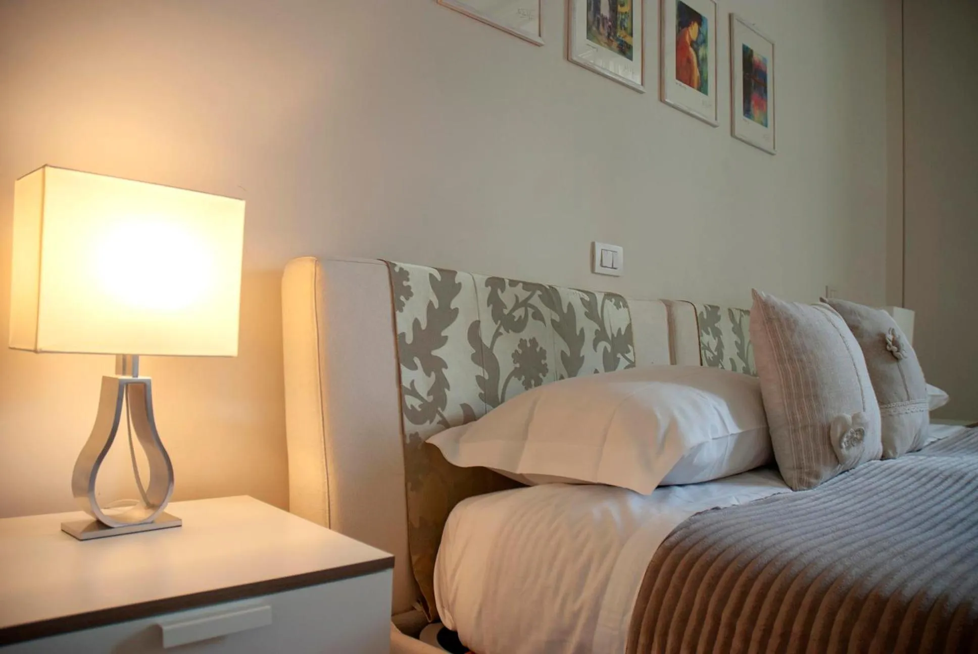 Bed in Bea Suites Luxury Rooms