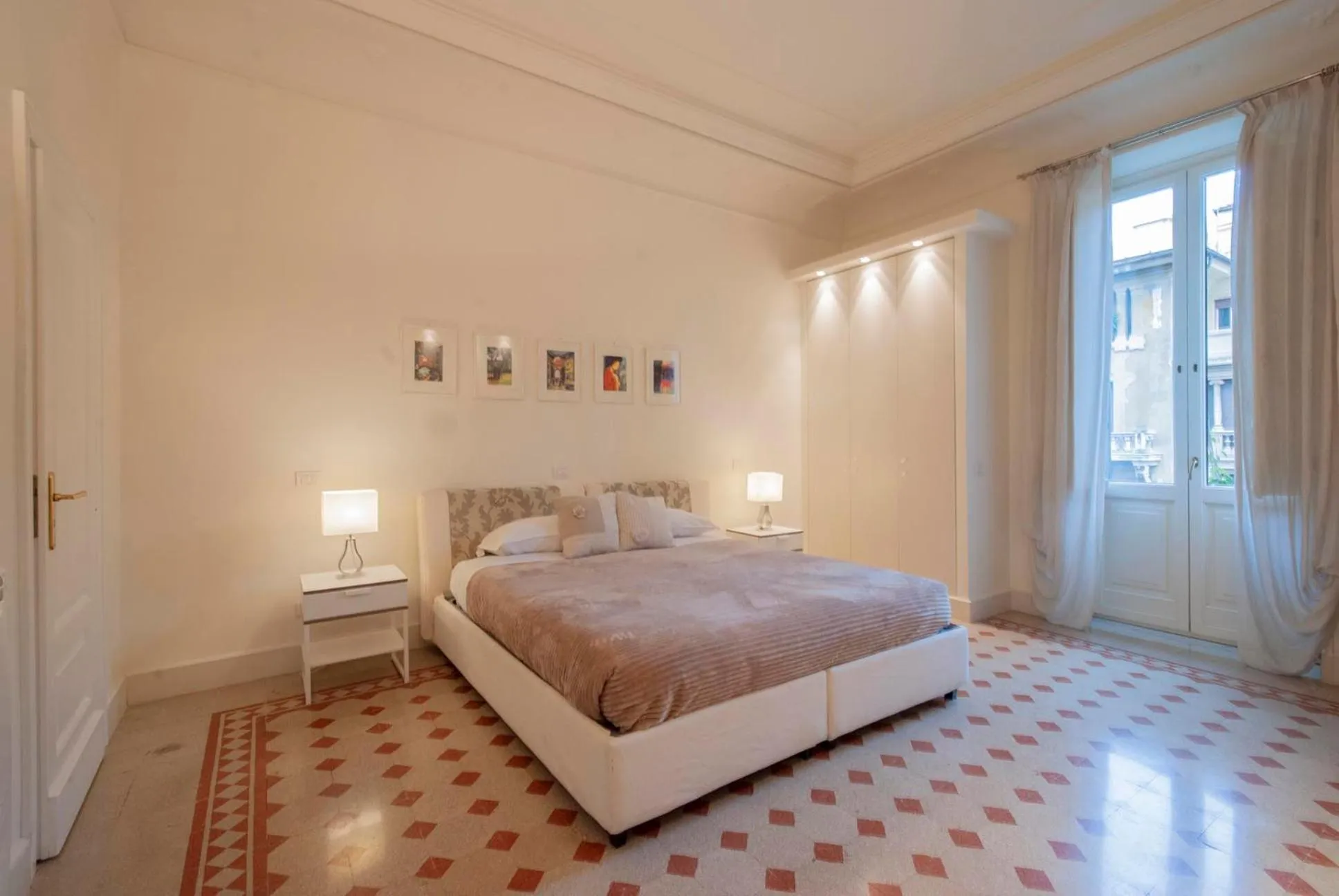 Bed in Bea Suites Luxury Rooms