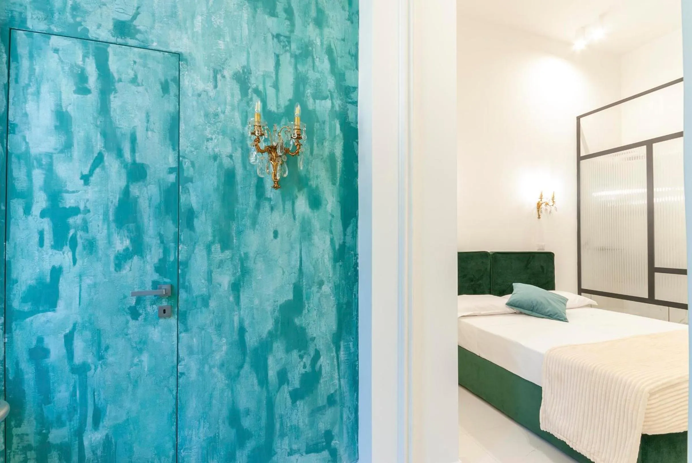 Bed in Bea Suites Luxury Rooms