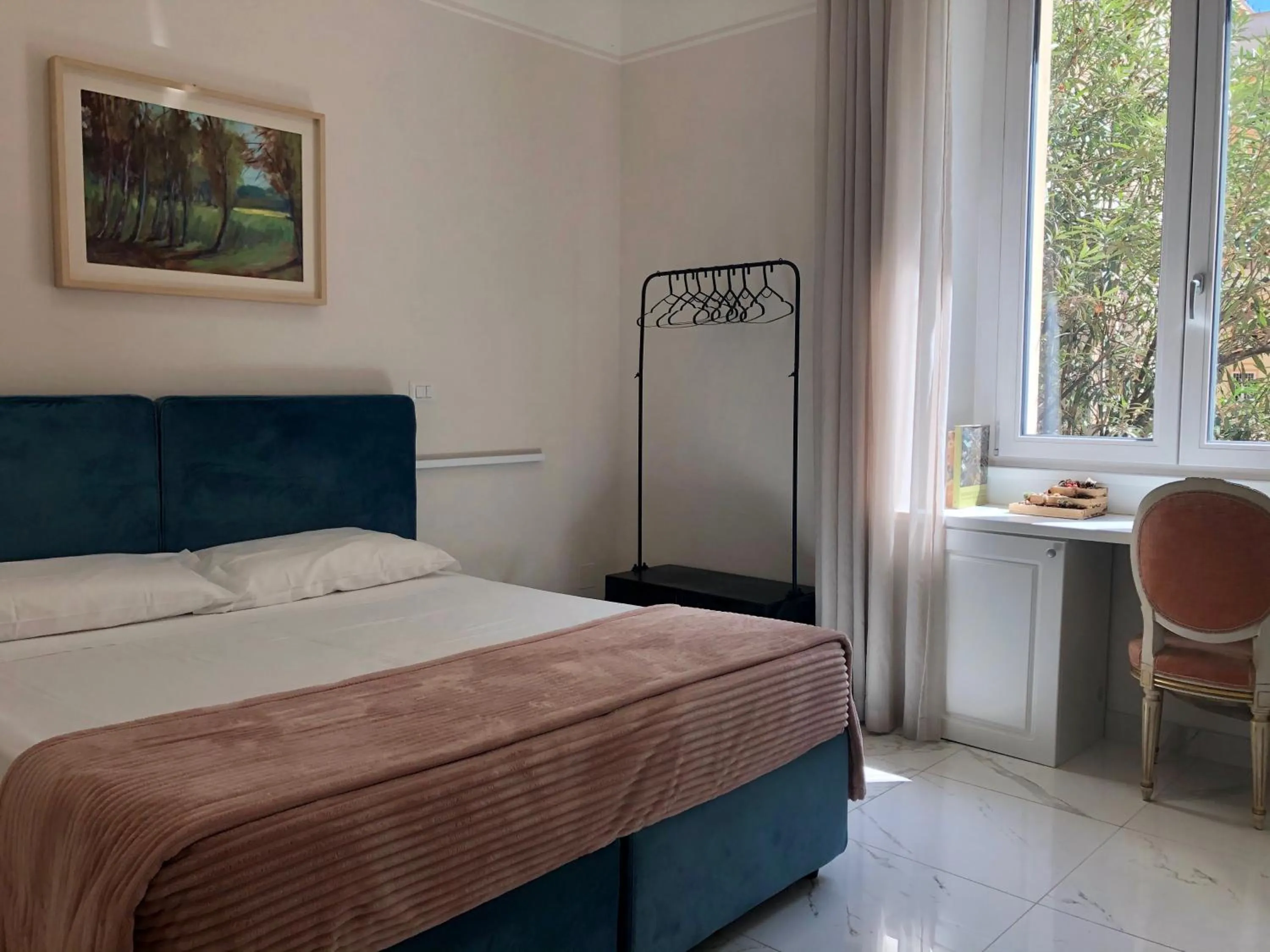 Bed in Bea Suites Luxury Rooms