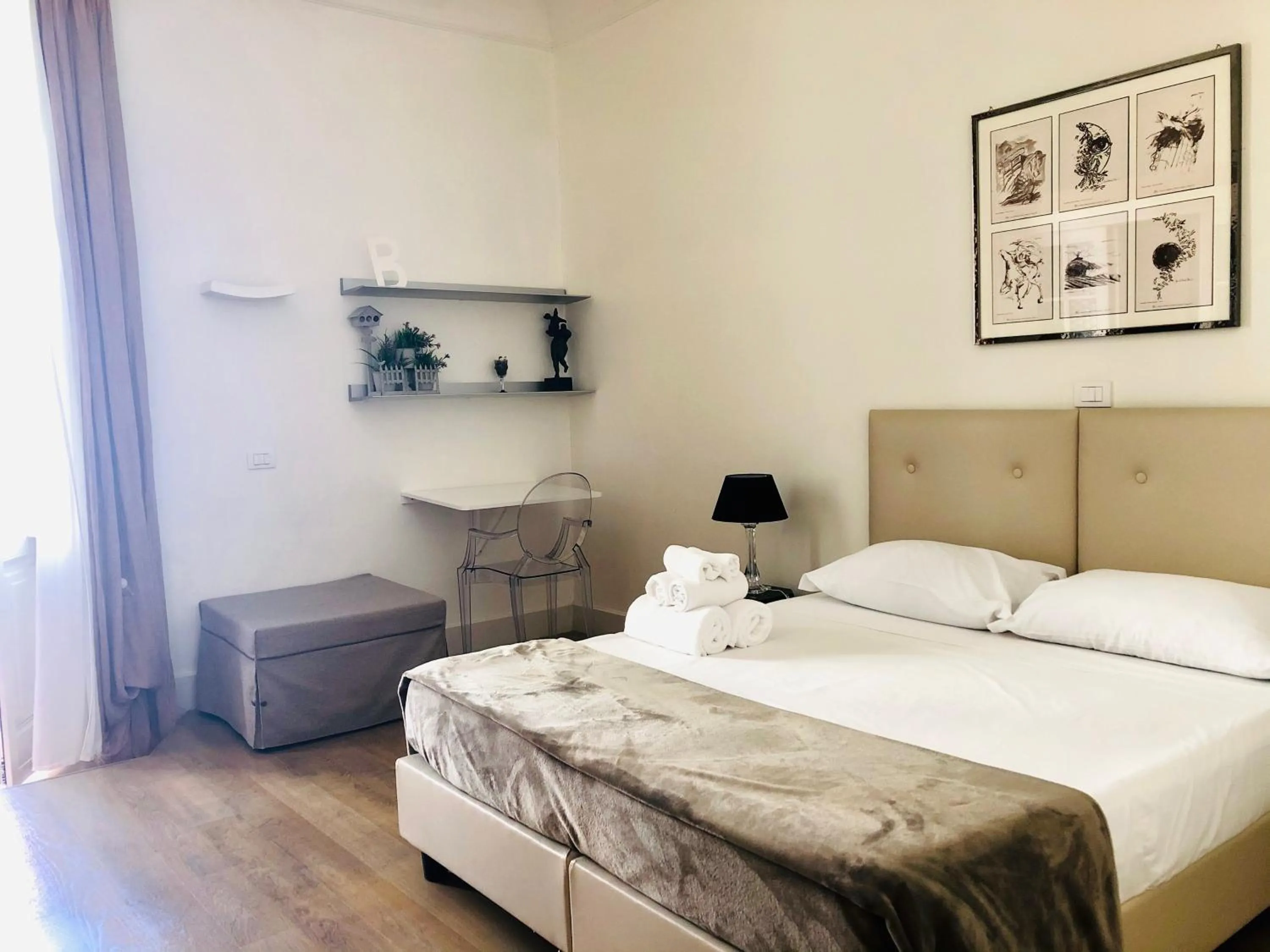 Bed in Bea Suites Luxury Rooms