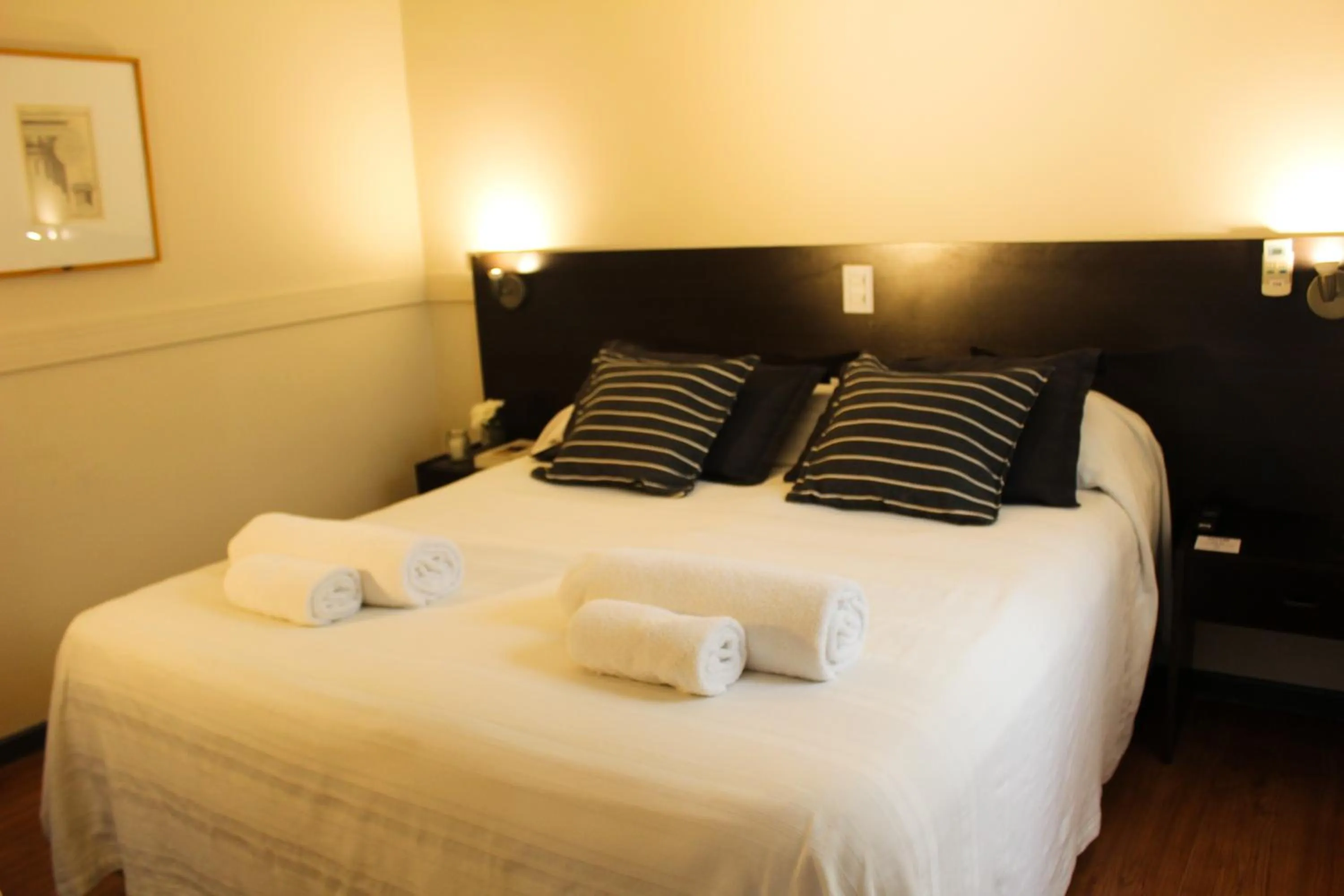 Bed in Abril Hotel Boutique