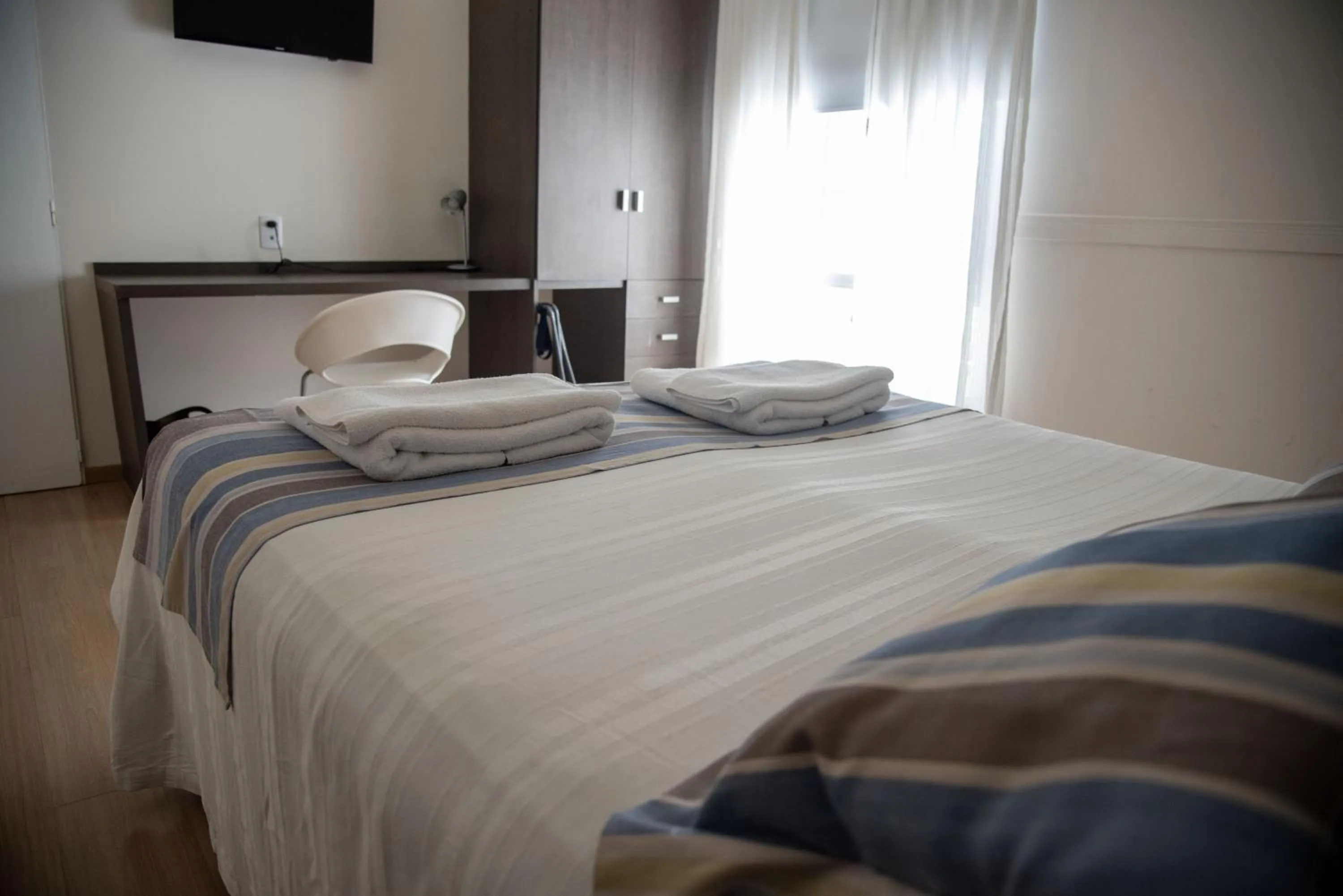 Bed in Abril Hotel Boutique