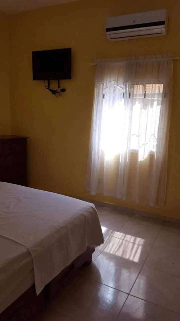 Bed in Caribbean Hotel Santo Domingo
