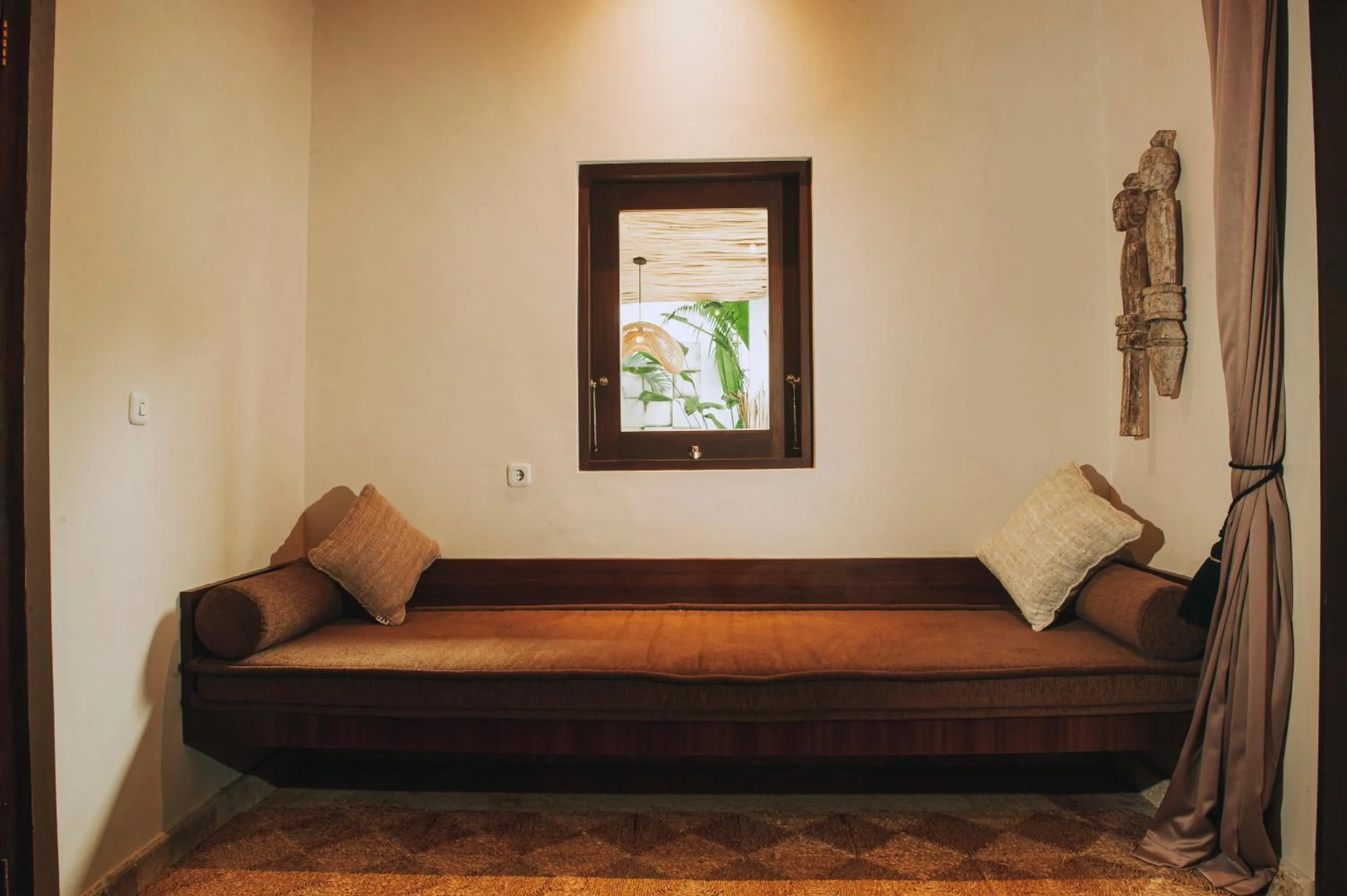 Seating area, Bed in Nunamkhalu Private Villa and Spa