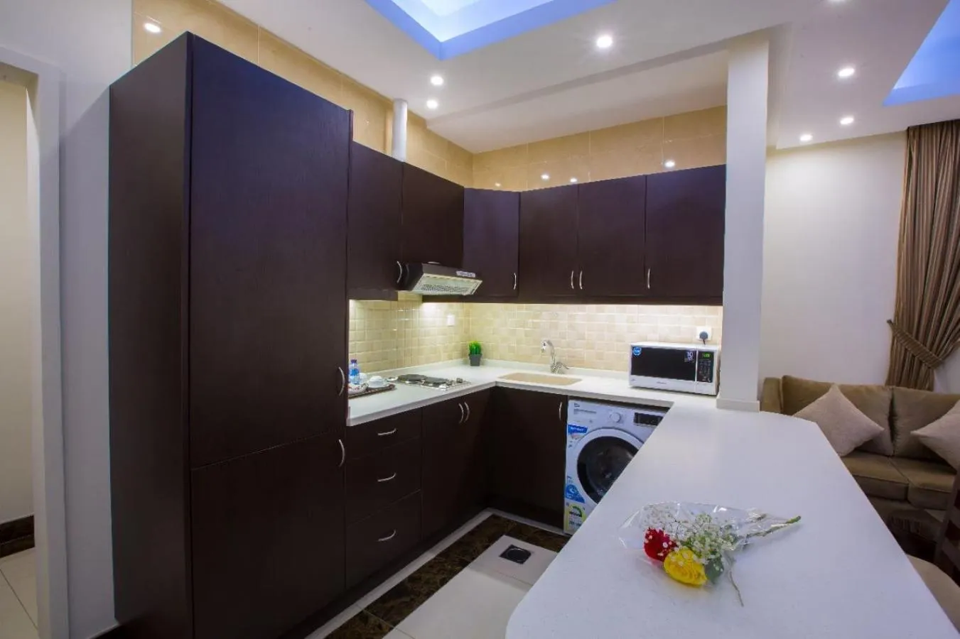 Kitchen or kitchenette in Sun Park Hotel Suites