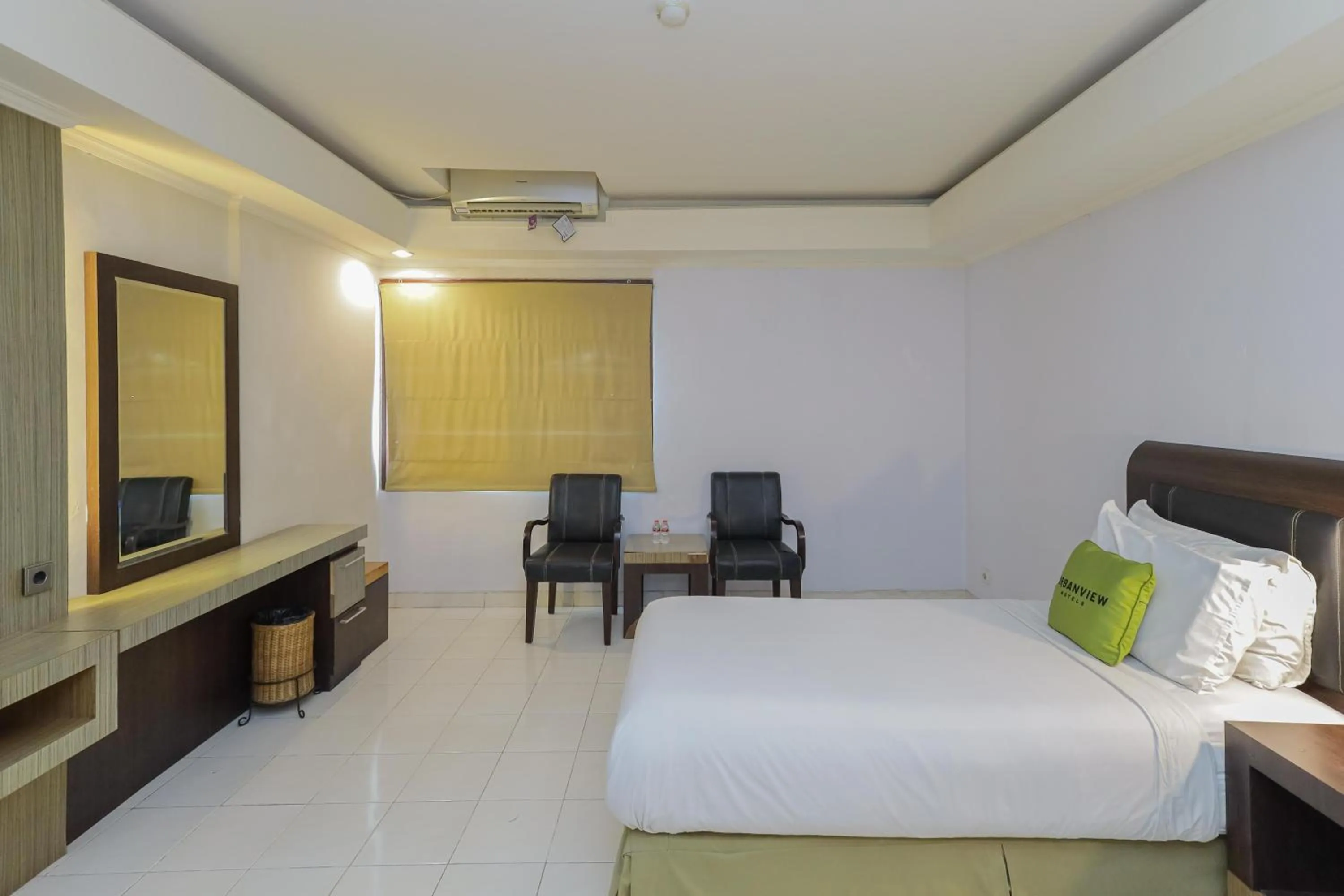 Bedroom, Bed in Urbanview Hotel Taman Suci Denpasar Bali