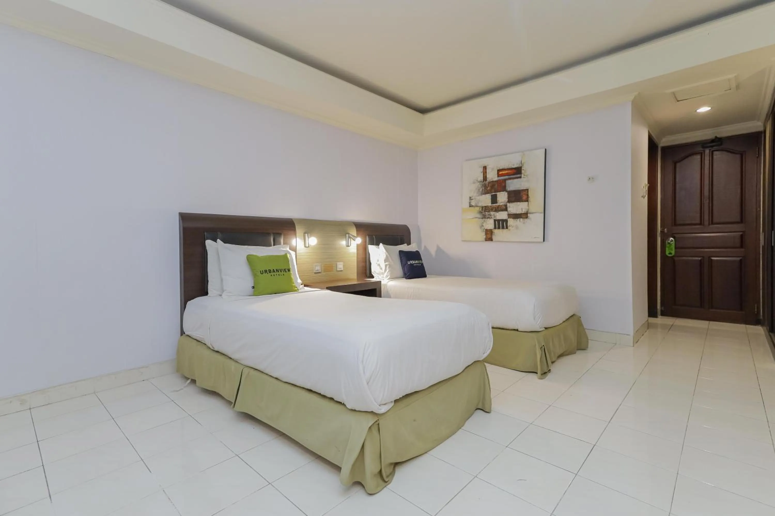 Bedroom, Bed in Urbanview Hotel Taman Suci Denpasar Bali