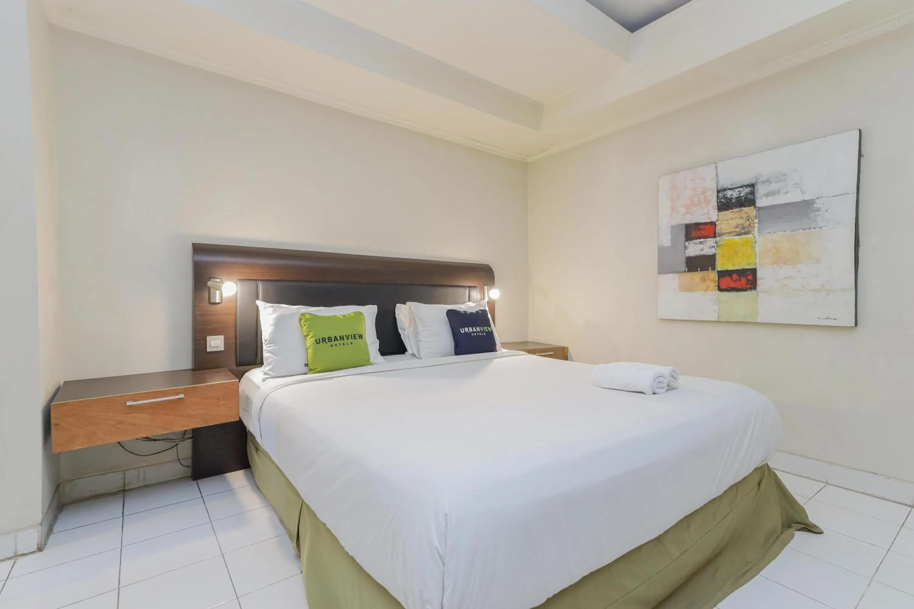 Bedroom, Bed in Urbanview Hotel Taman Suci Denpasar Bali
