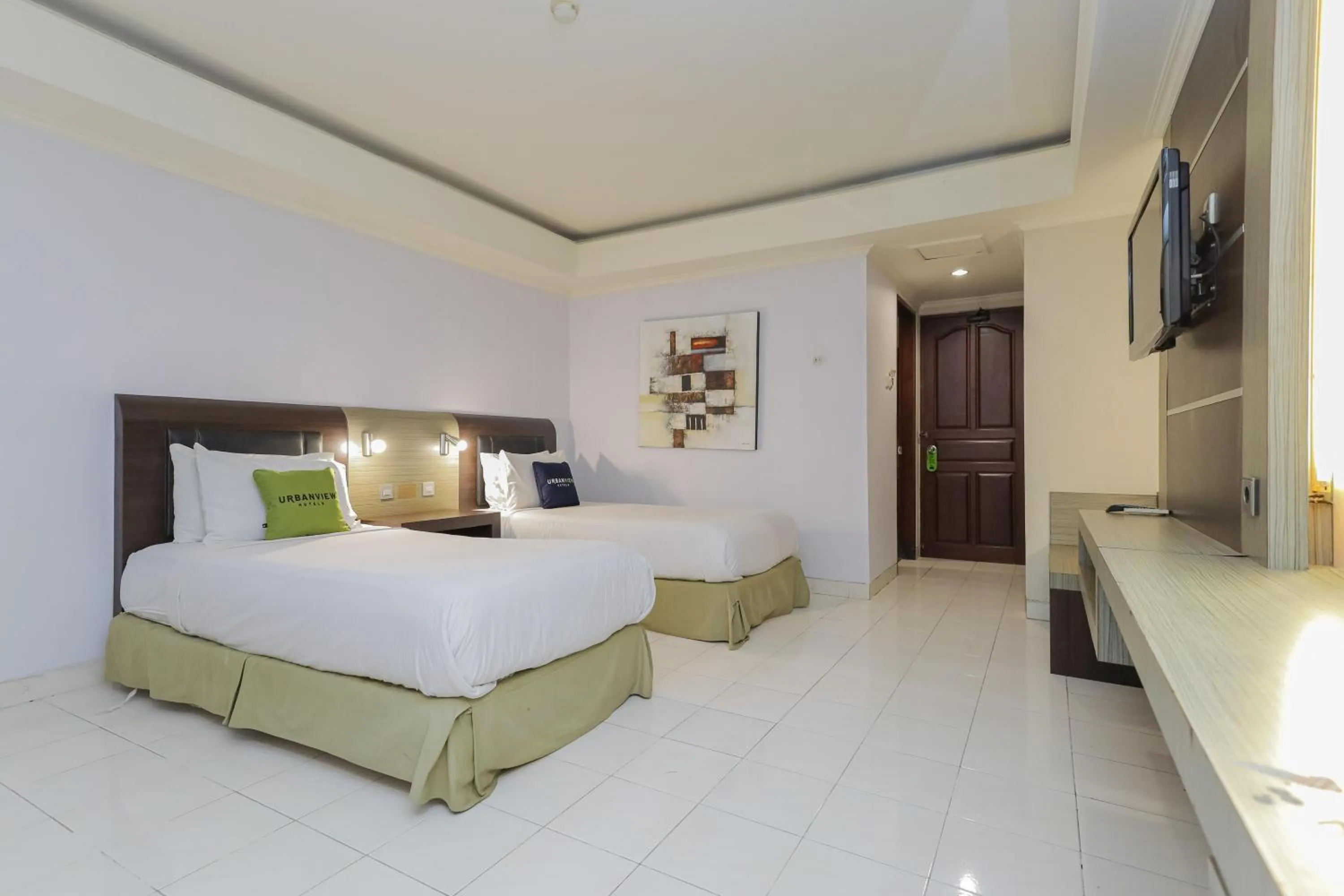 Bedroom, Bed in Urbanview Hotel Taman Suci Denpasar Bali