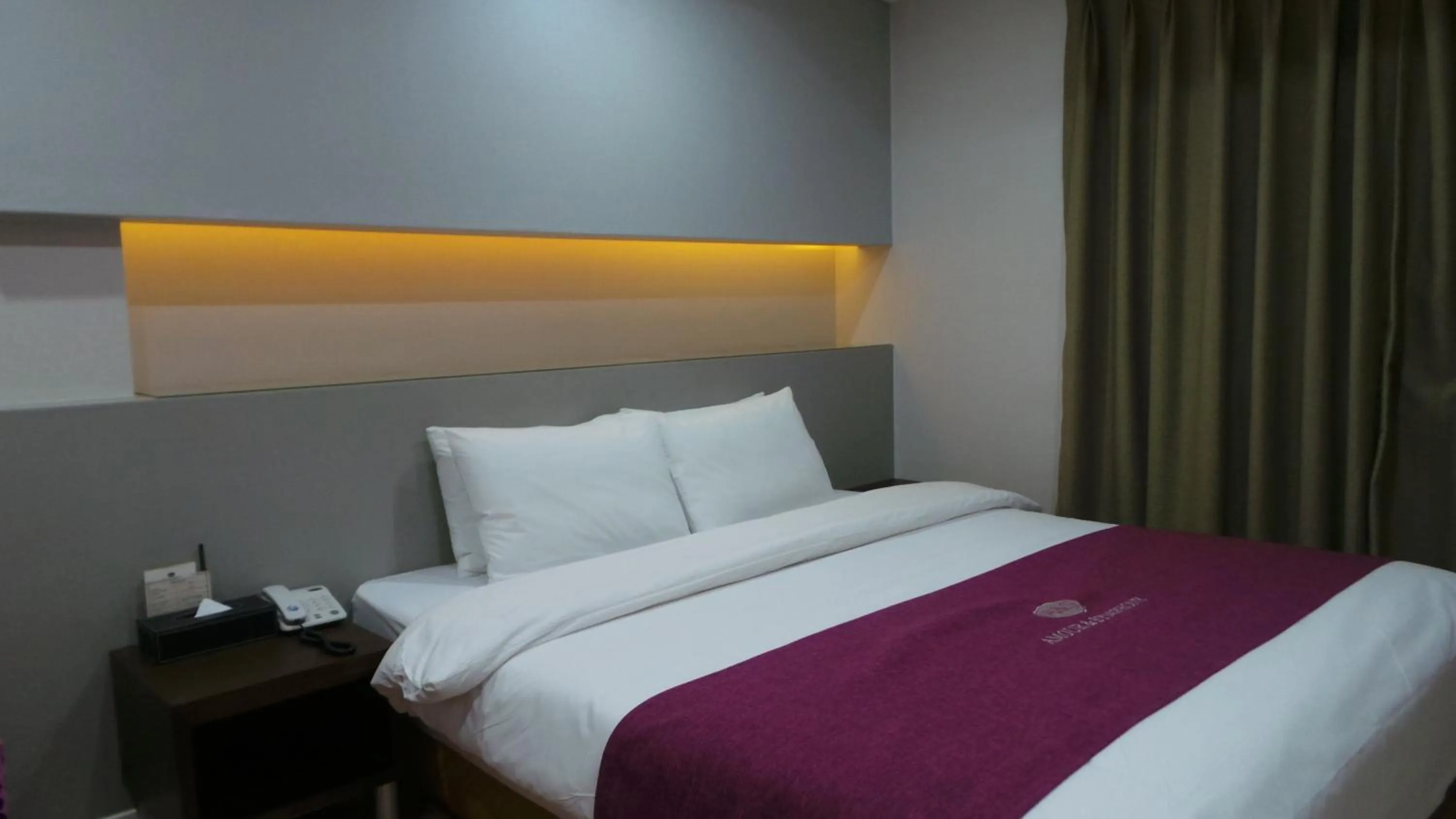 Bed in Amour Hotel