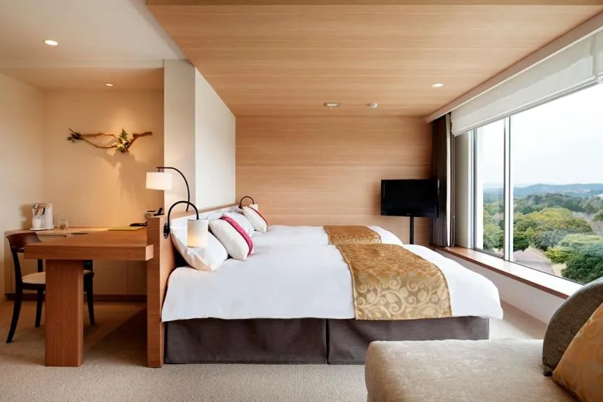 Bed in Nemu Resort Hotel Nemu