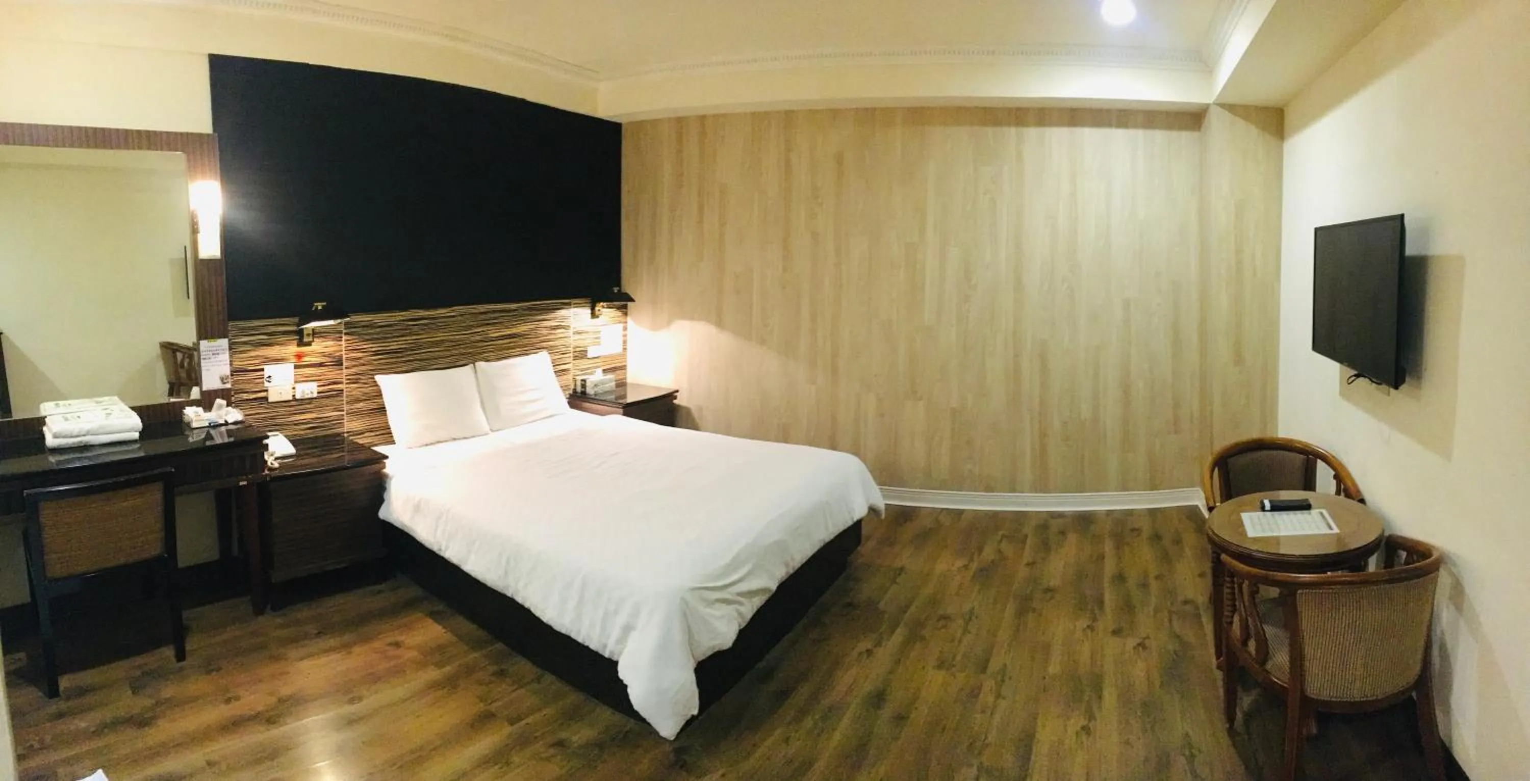 Bed in Hua Tai Hotel