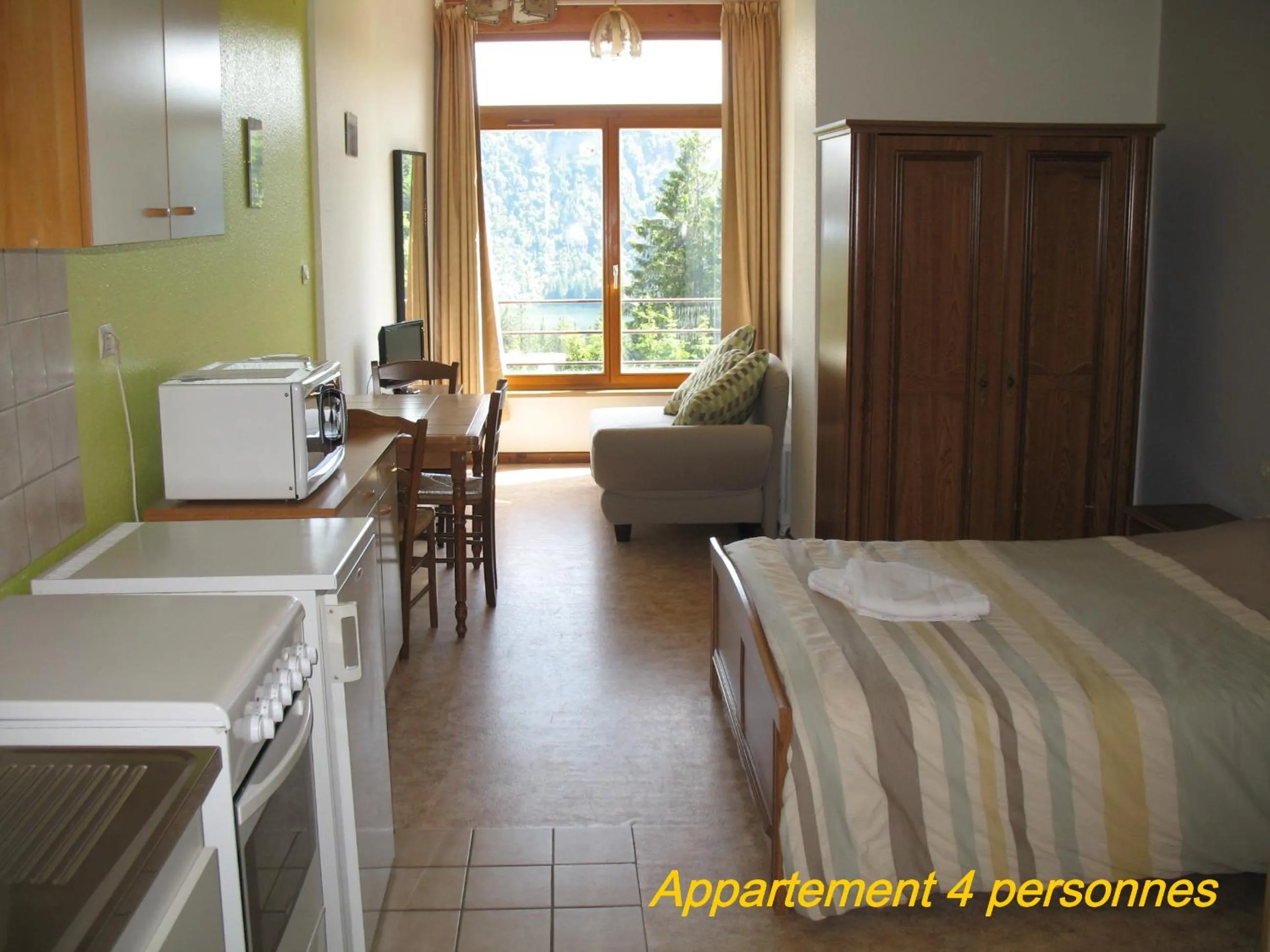 Bed in Les Terrasses du Lac Blanc - Studios & Appartements
