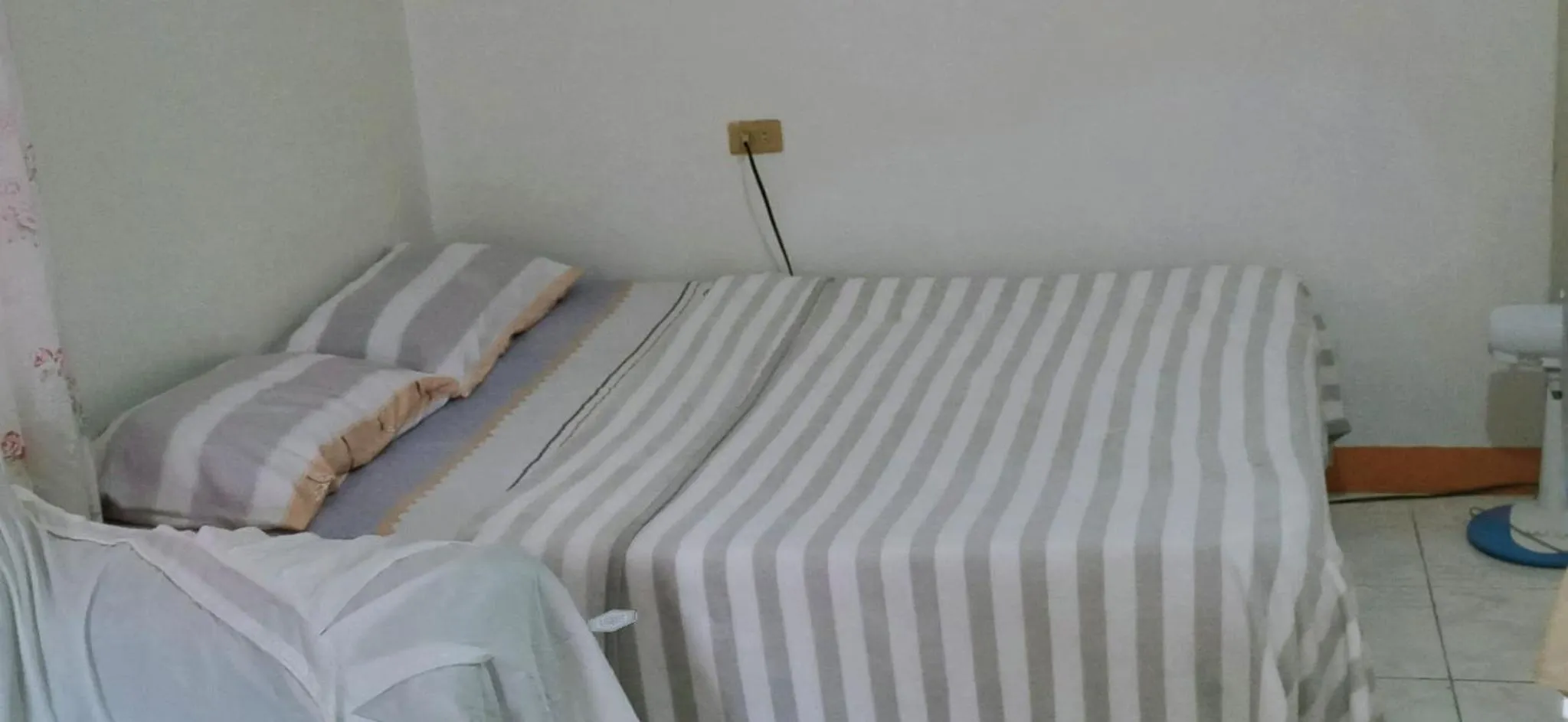 Bed in Riverside at Aninuan Accommodation and Food