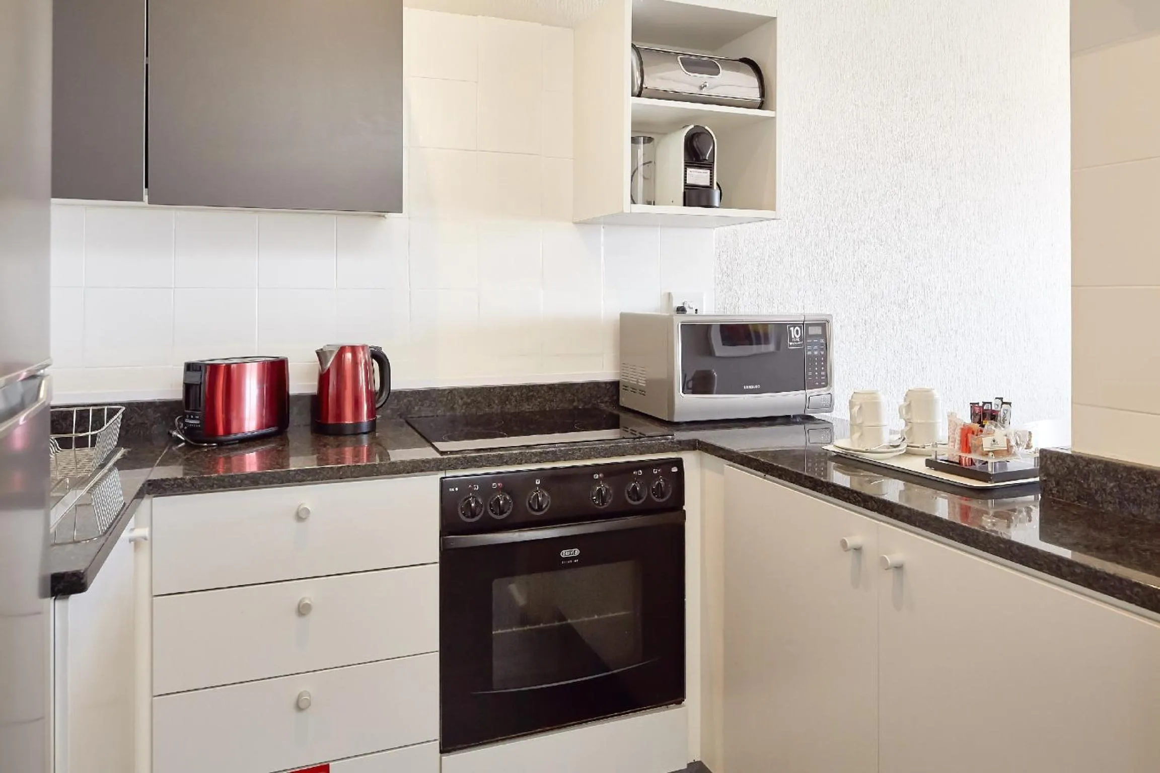 Kitchen or kitchenette in First Group Riviera Suites