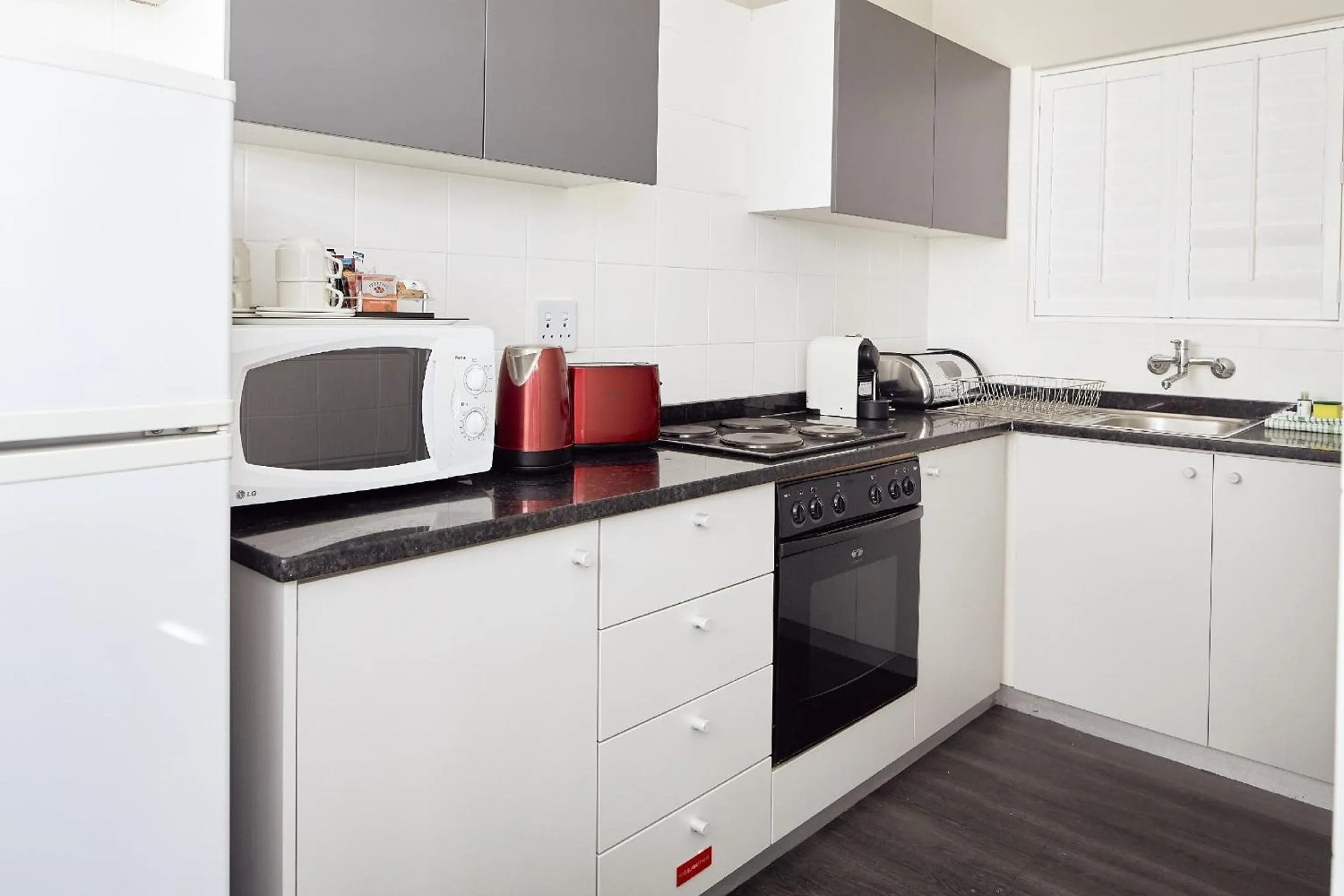 Kitchen or kitchenette in First Group Riviera Suites