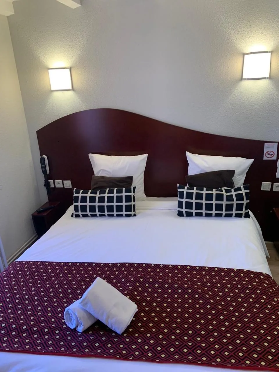 Bed in Hotel les Commercants