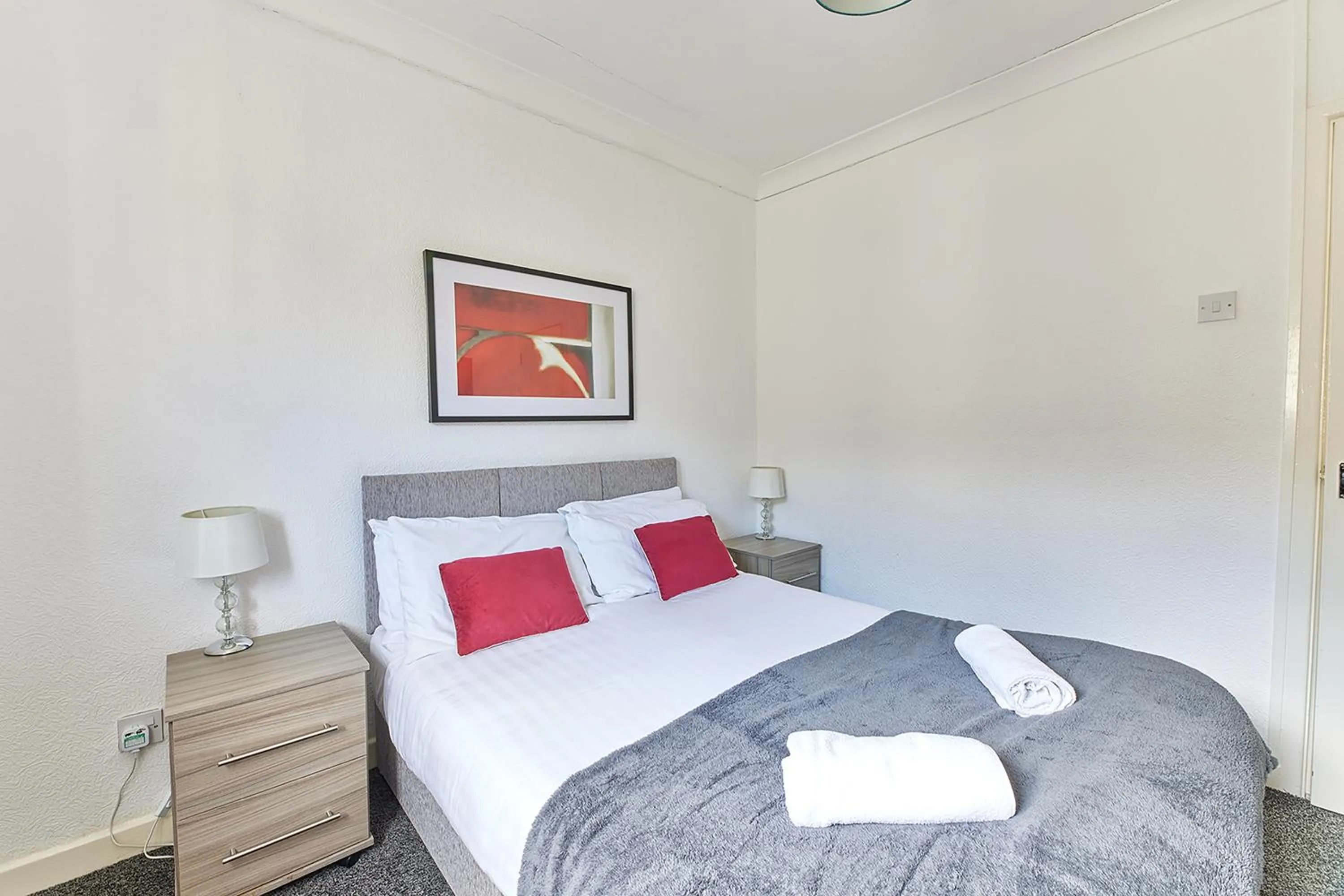 Bed in Pleasure Holiday Apartments