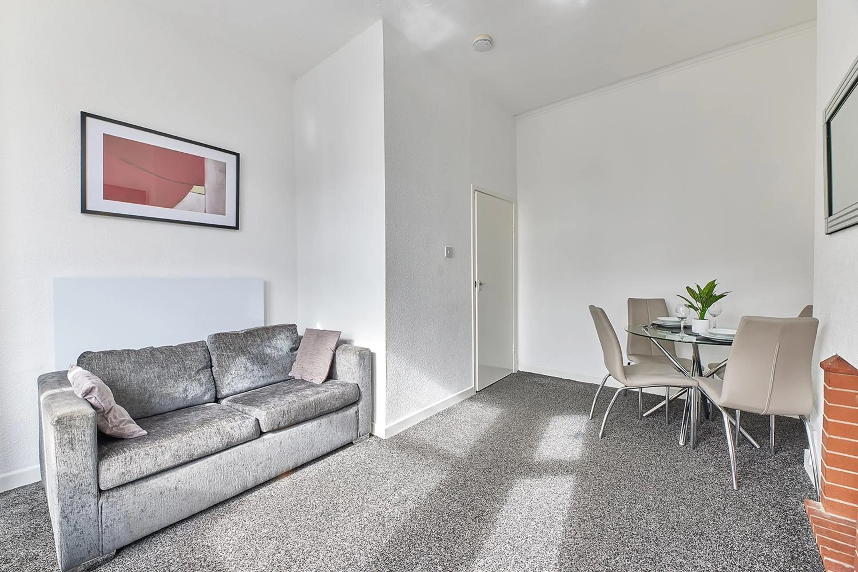 Living room in Pleasure Holiday Apartments