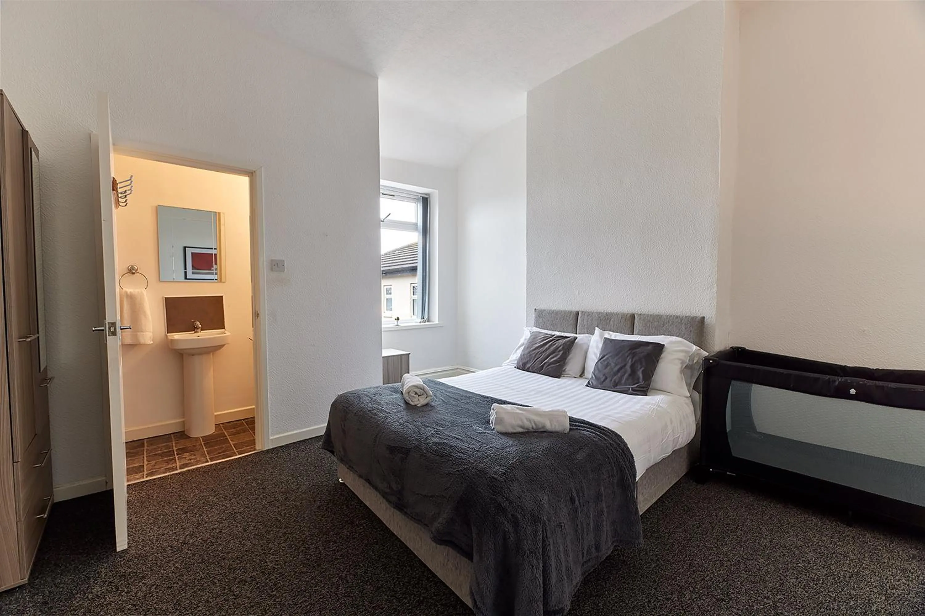 Bed in Pleasure Holiday Apartments