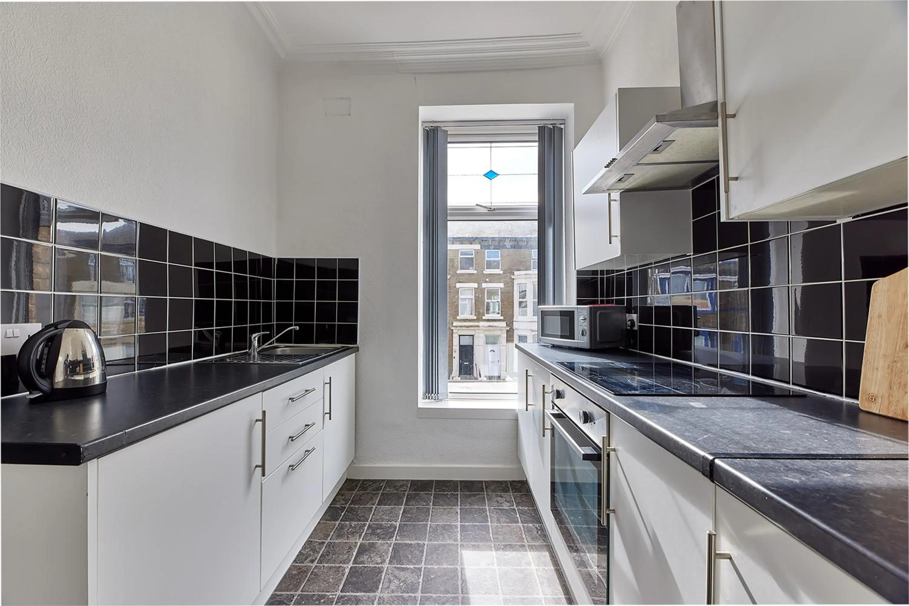 Kitchen or kitchenette in Pleasure Holiday Apartments