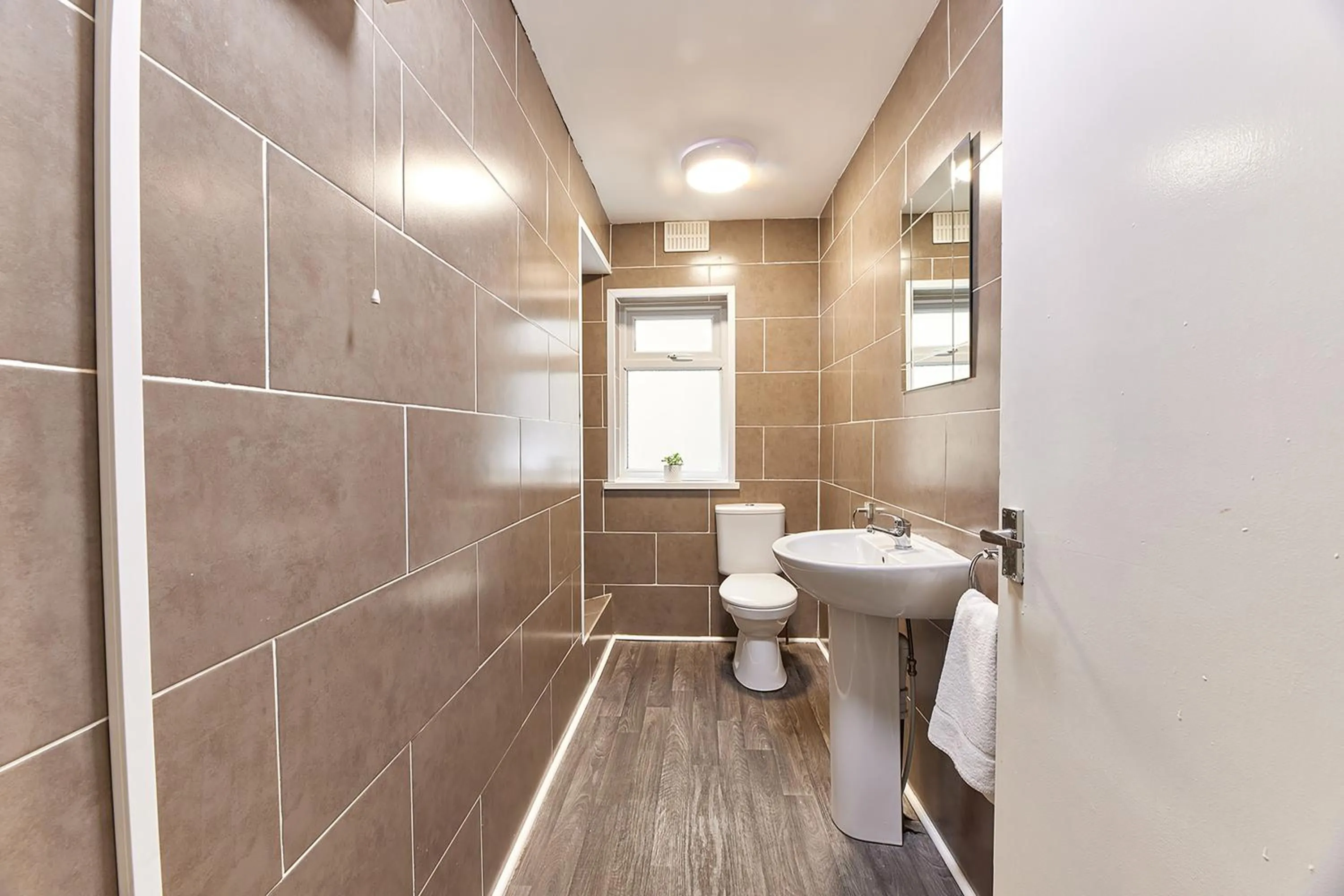 Toilet in Pleasure Holiday Apartments