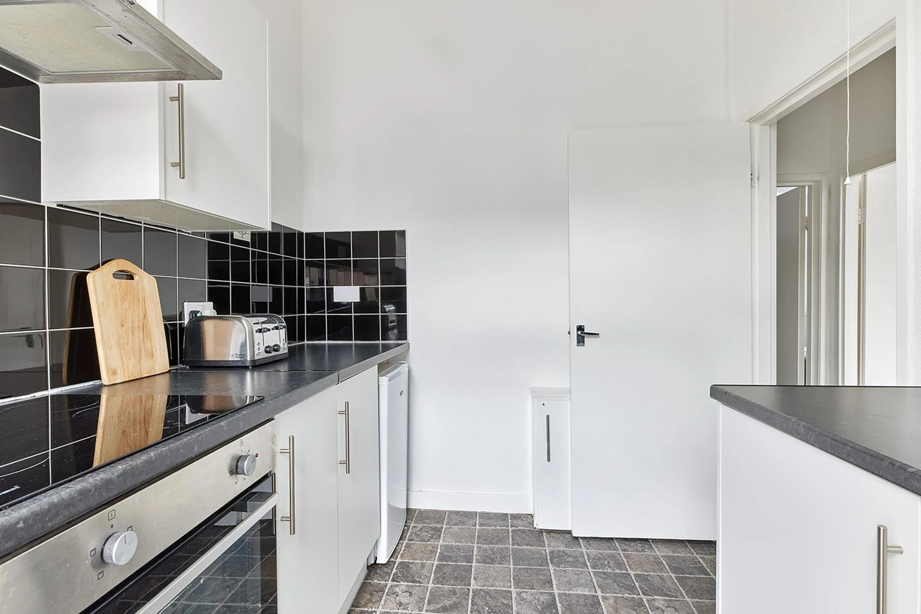 Kitchen or kitchenette in Pleasure Holiday Apartments