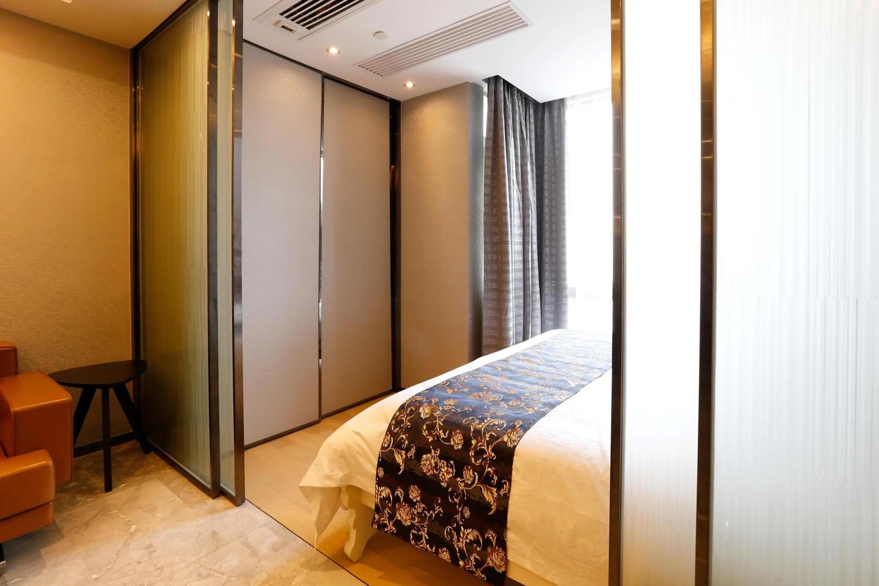 Bed in Boman Holiday Apartment Beijing Road Jie Deng Du Hui Branch