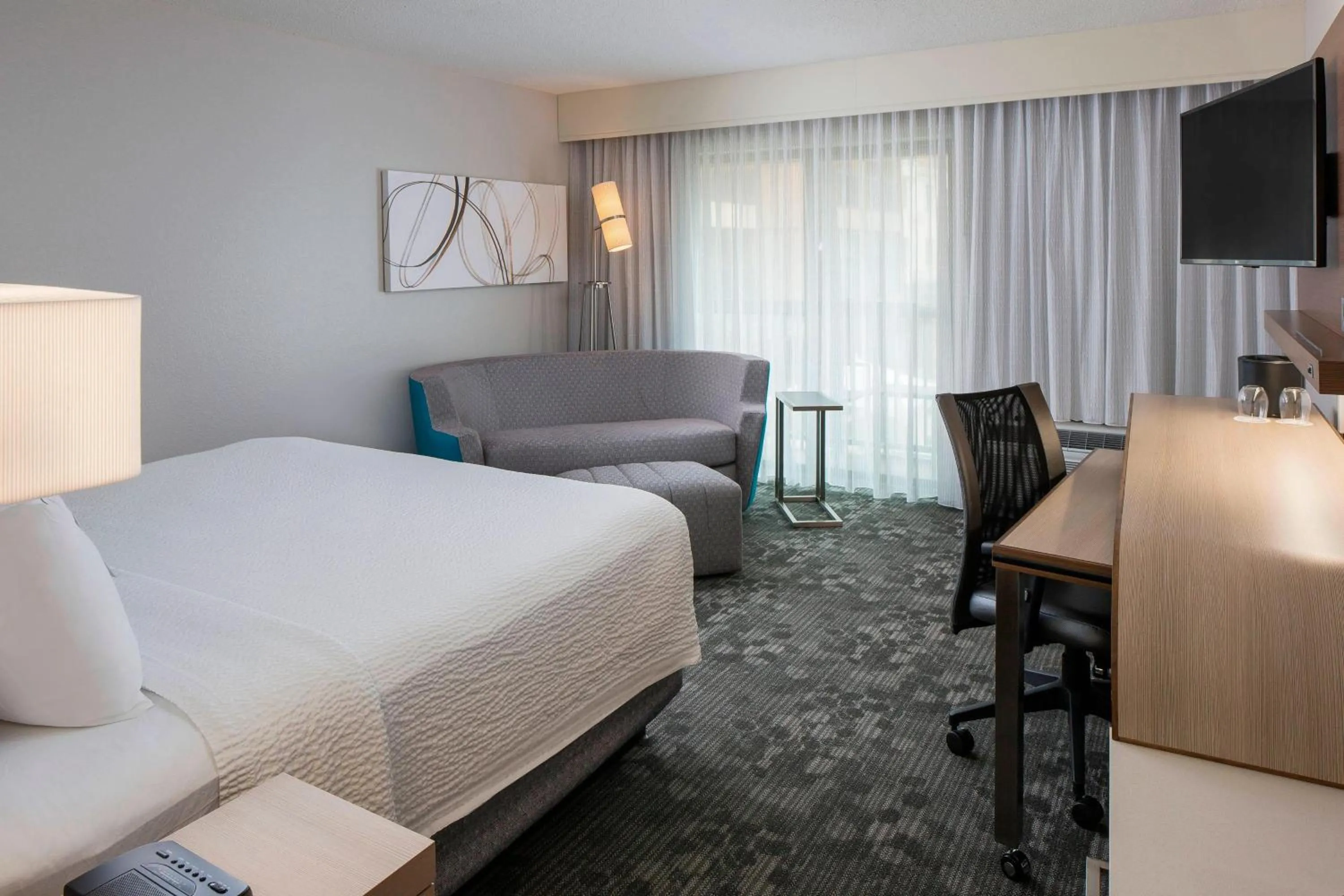 King Room with Sofa Bed and Roll-in Shower - Mobility Accessible in Courtyard by Marriott Daytona Beach Speedway/Airport