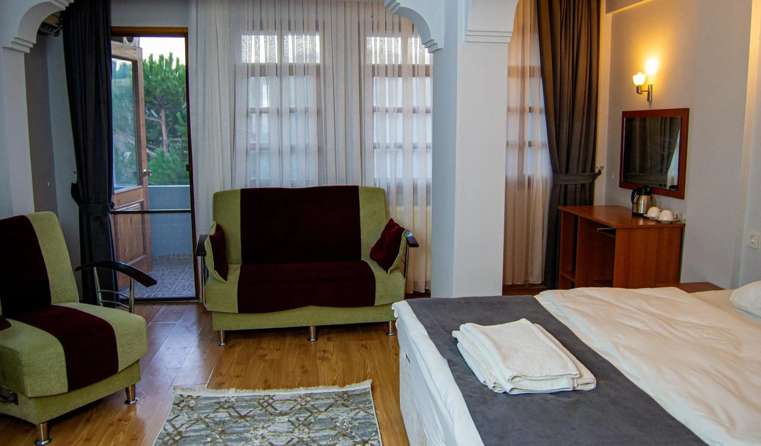 Bed in Kaltur Boutique Hotel