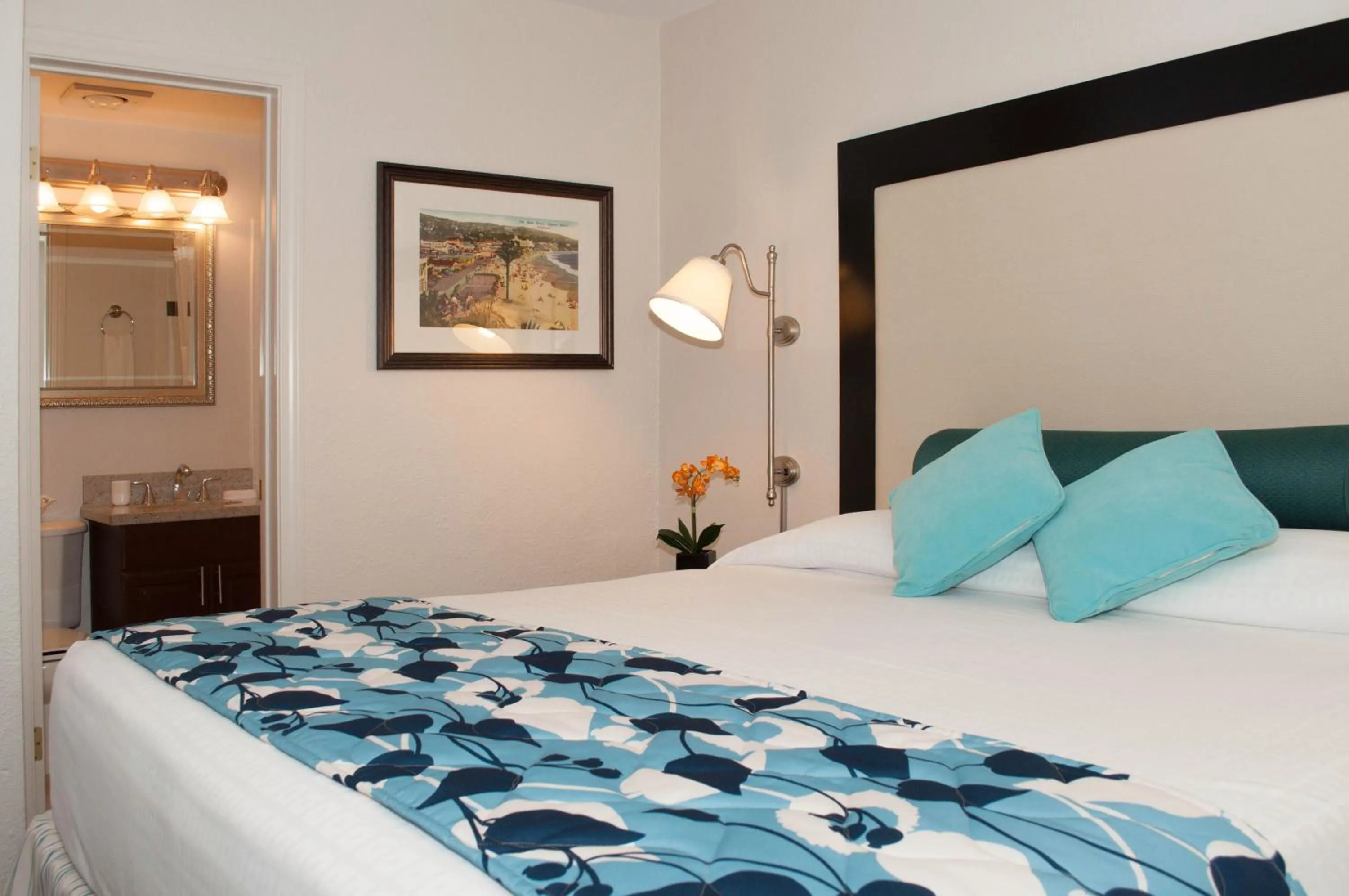 Bed in Laguna Shores Studio Suites