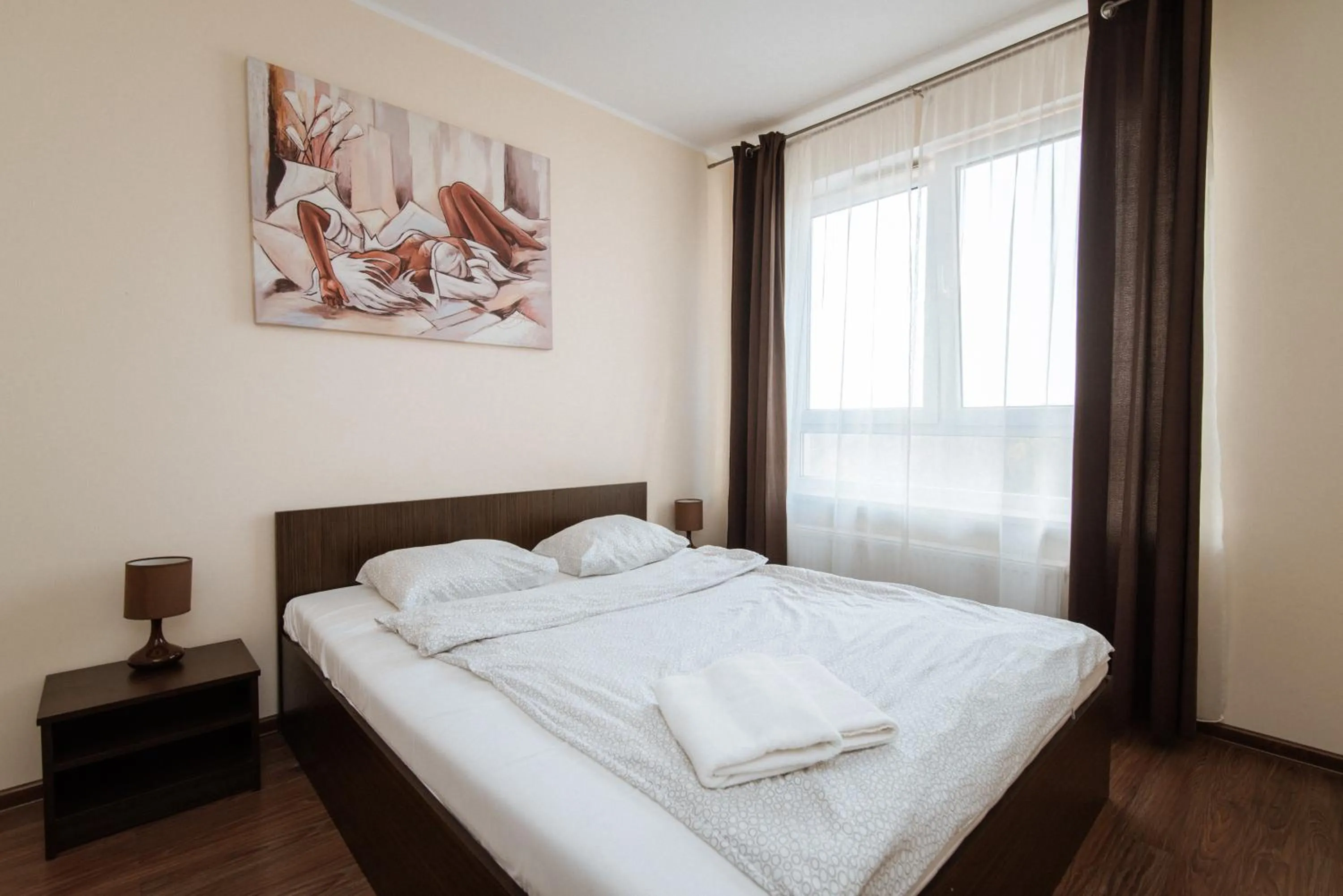 Bed in Senator Warsaw Apartments