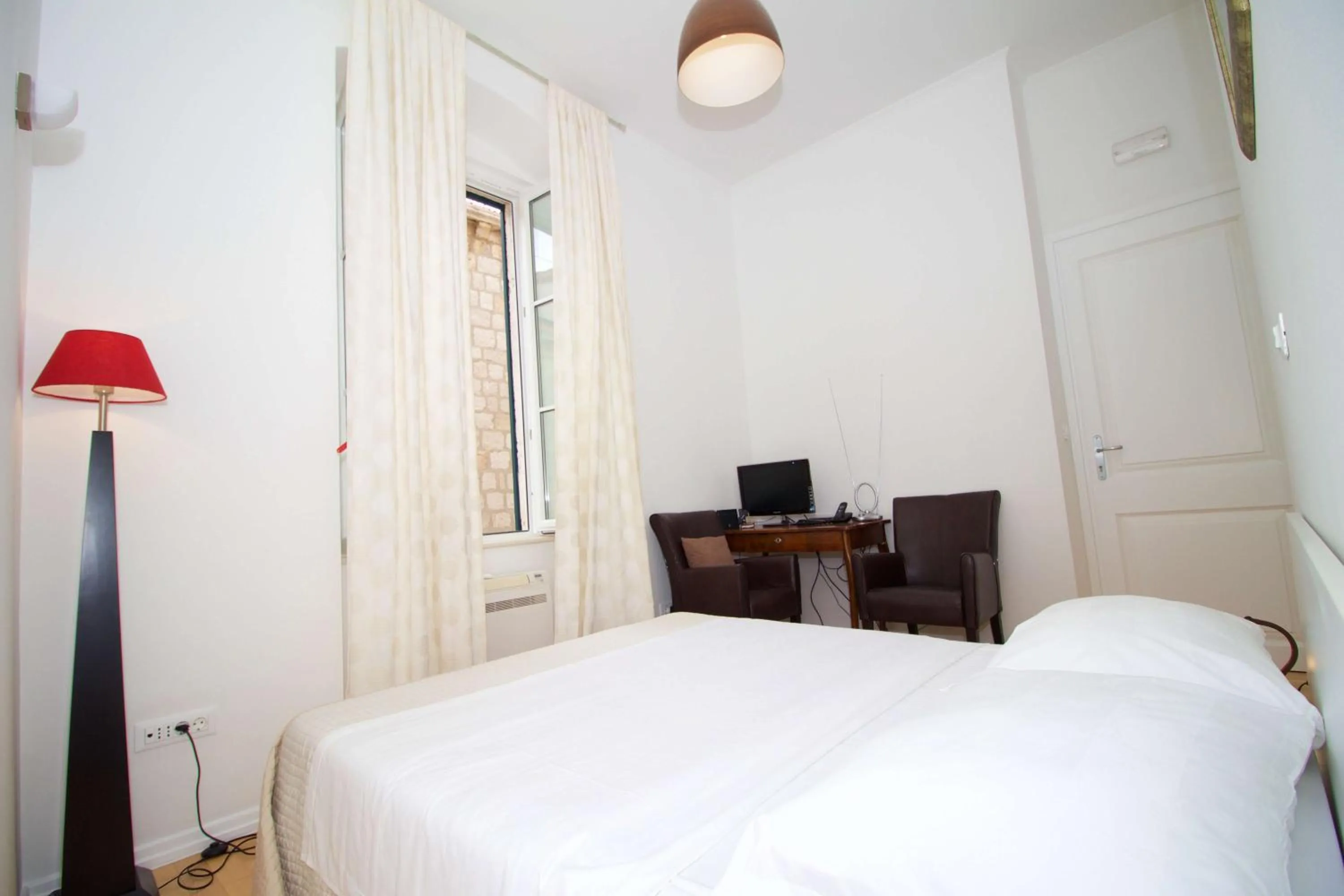 Bedroom, Bed in Miró Studio Apartments Dubrovnik